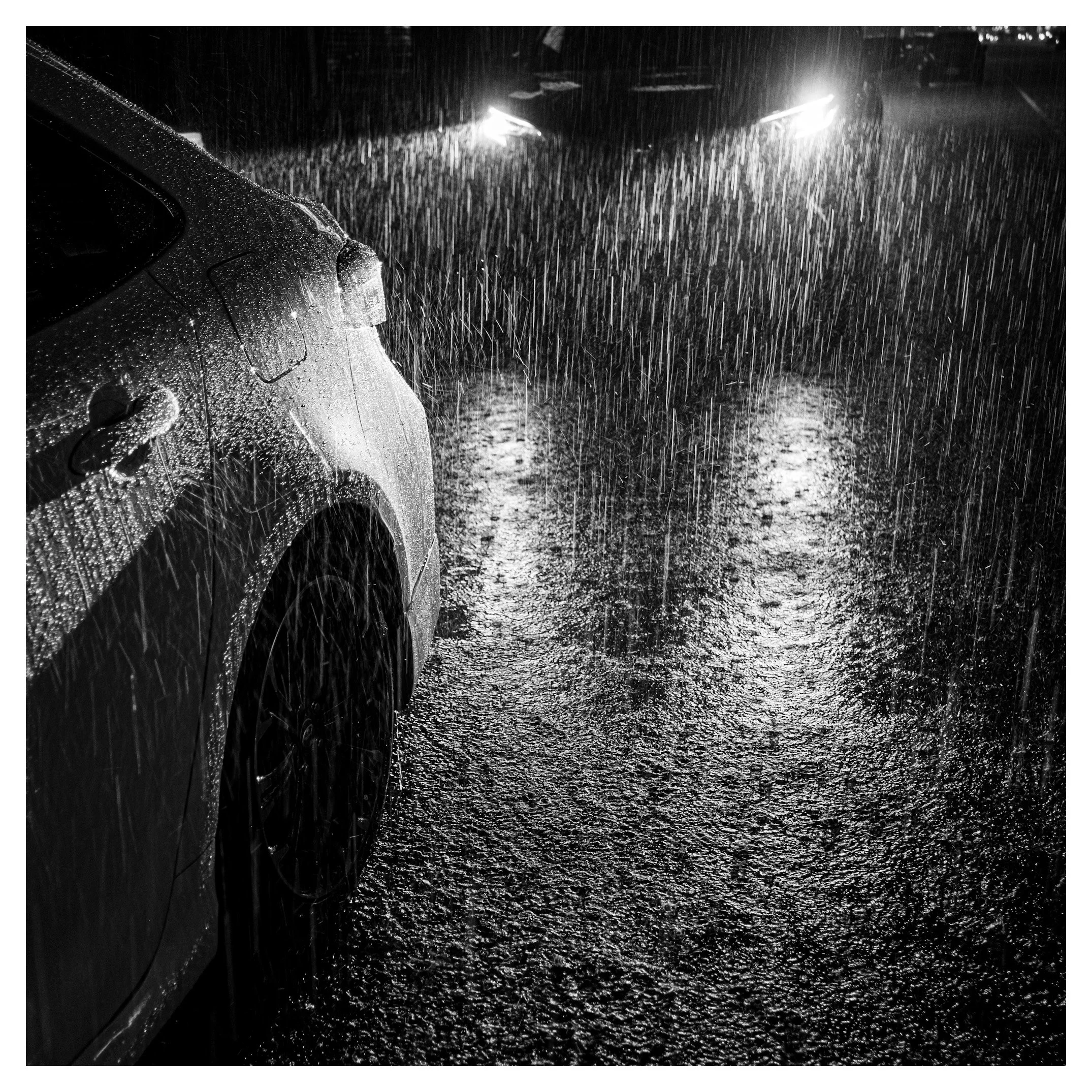 Day 247/365 Rain, Light, and the Asphalt Canvas: A Kaohsiung Critique