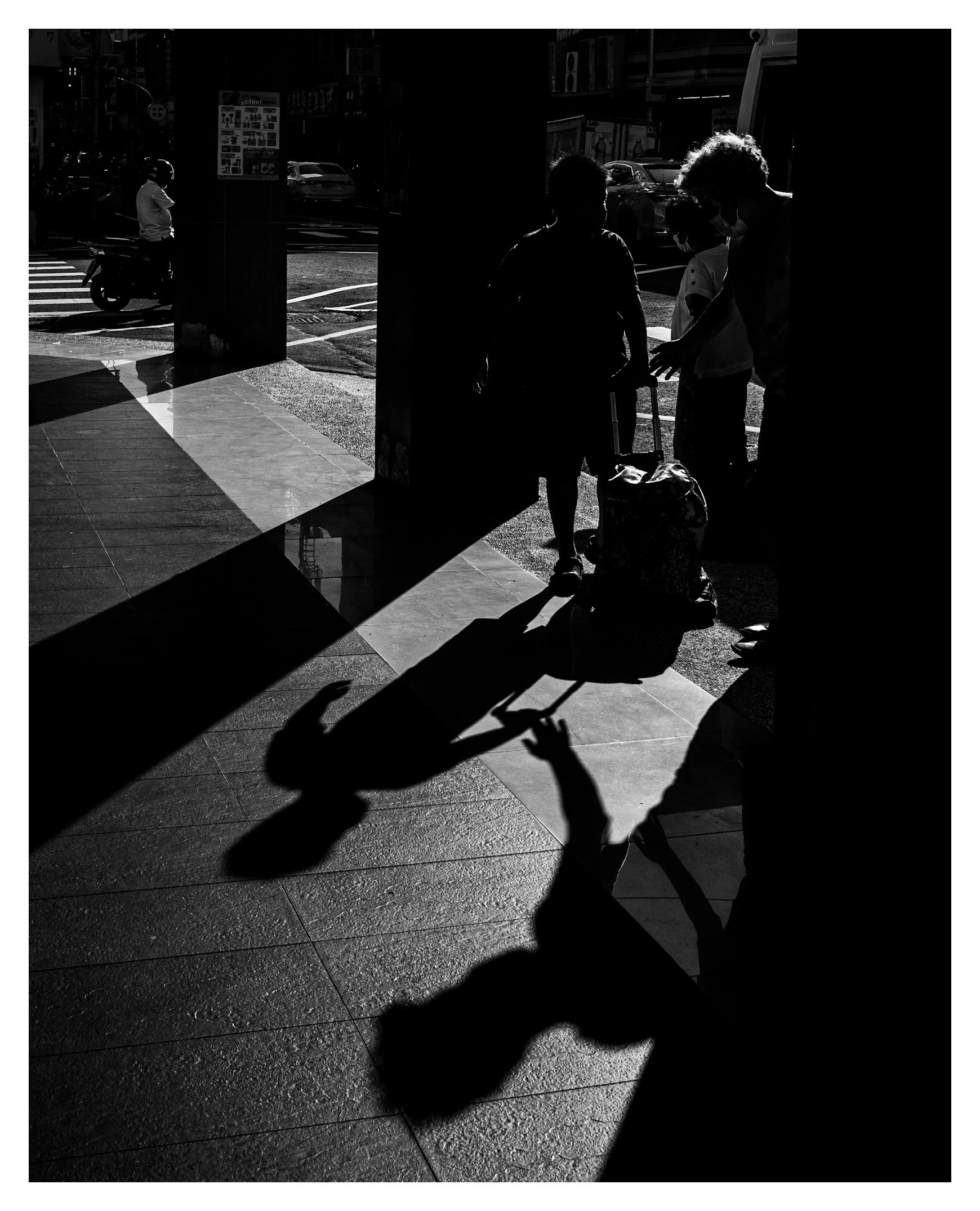 Day 255/365 Chasing Chiaroscuro: Geometry and Ghostly Silhouettes on the Kaohsiung Asphalt