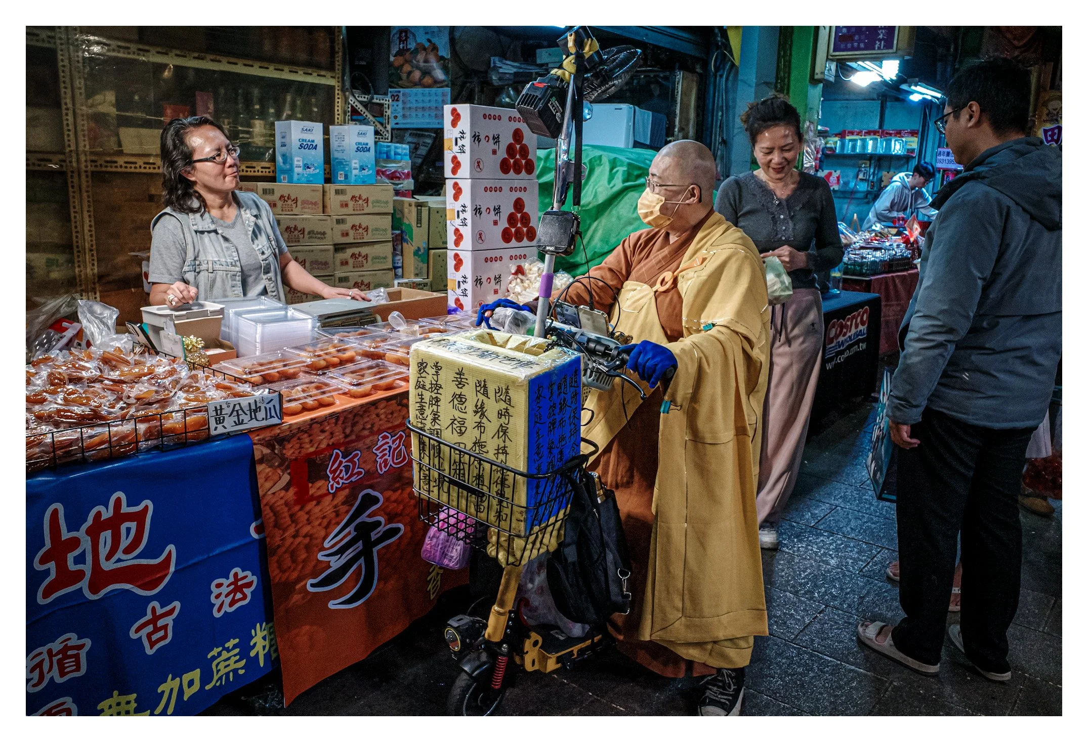 Day 112/365 The Saffron Rider: Tradition Amidst the neon