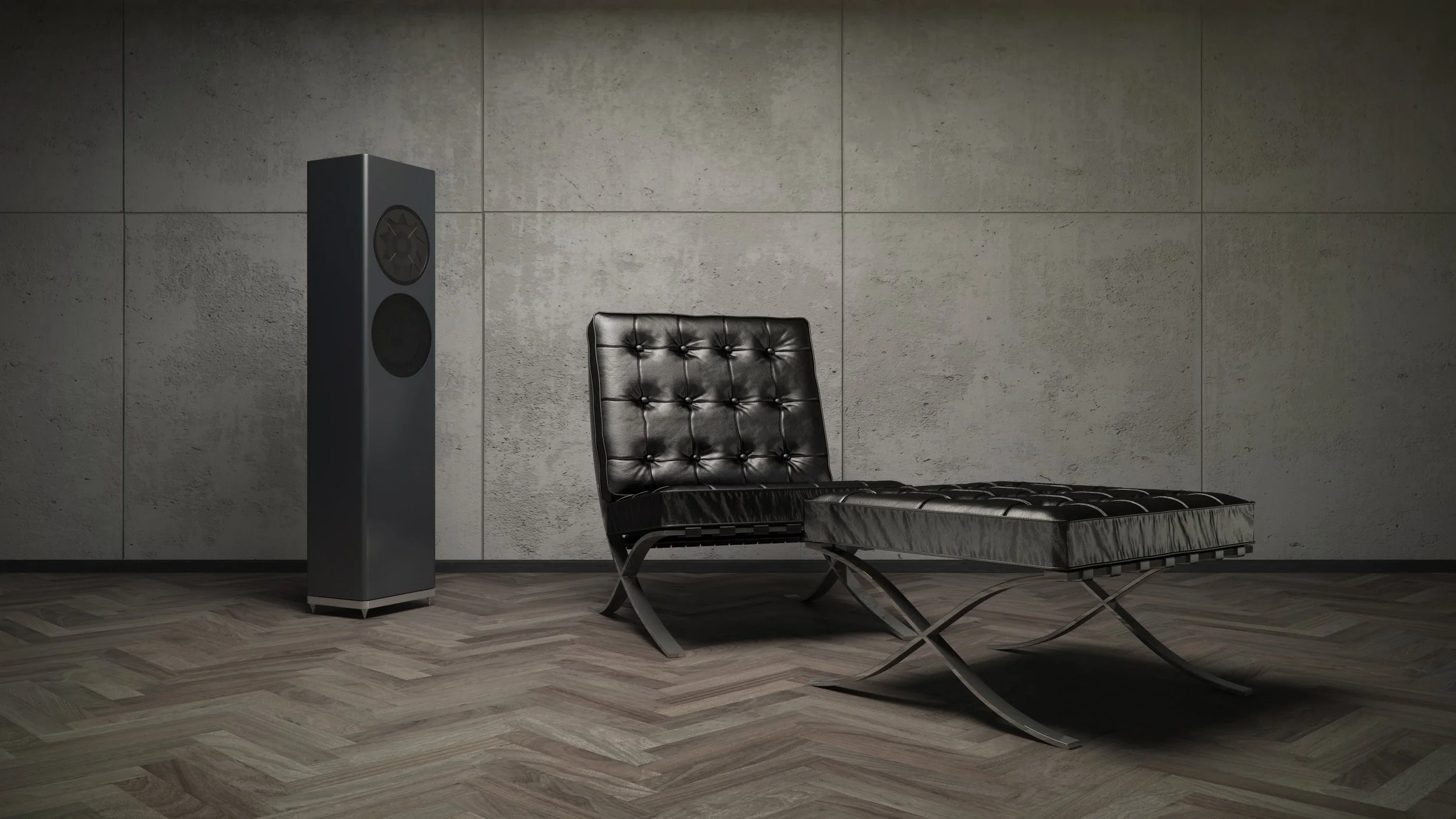 Ein schwarzes Leder-Sessel mit Knopfsteppung neben einem schwarzen Lautsprecher in einem Raum mit grauer Wand und Holzboden.