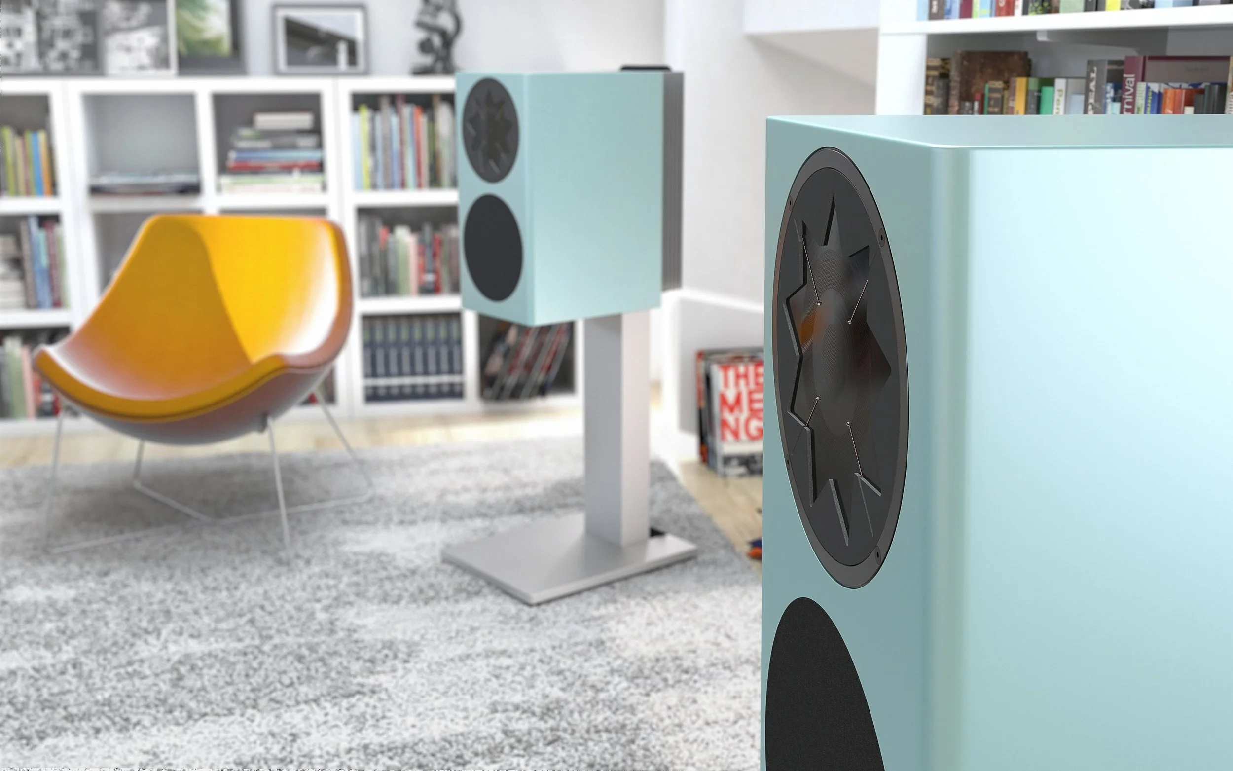 Manger Audio c1 neben einem gelben Ledersessel