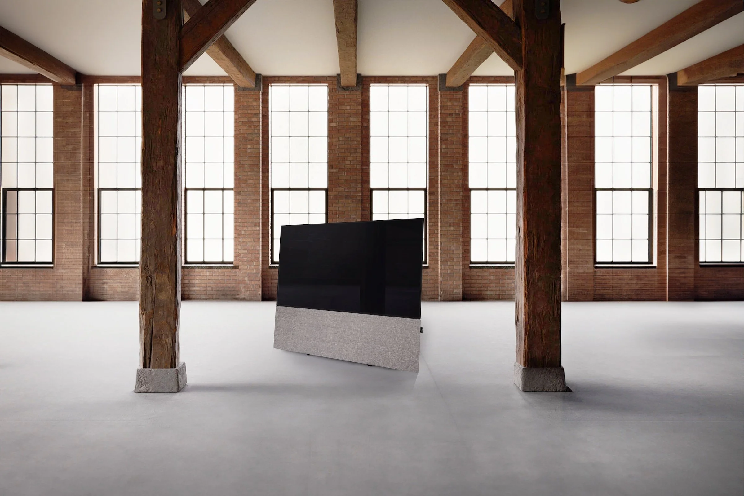 Canvas HiFi Soundbar unter einem Bildschirm 
 in einem Loft