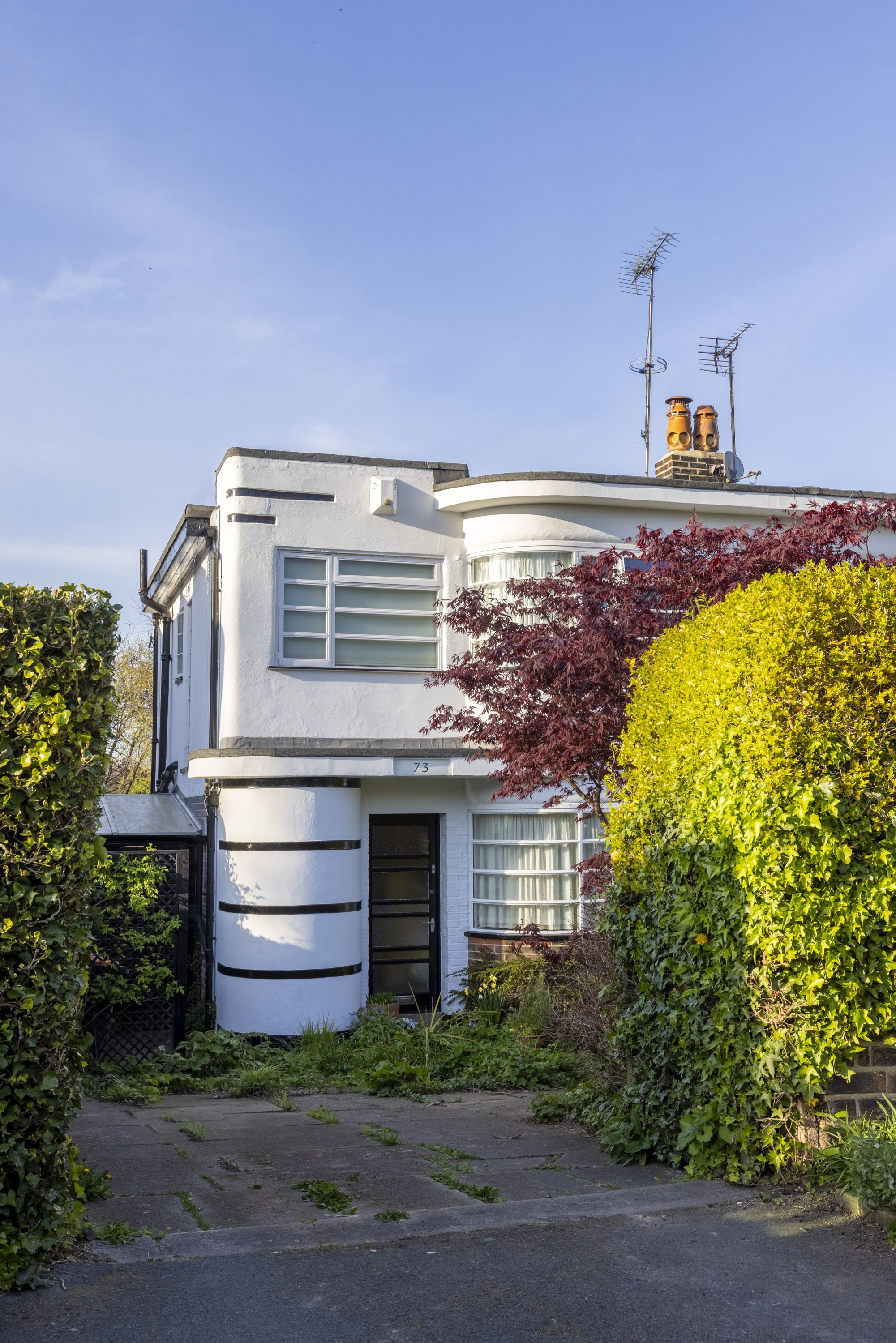 A 1930s Art Deco property taken on a sunny day.