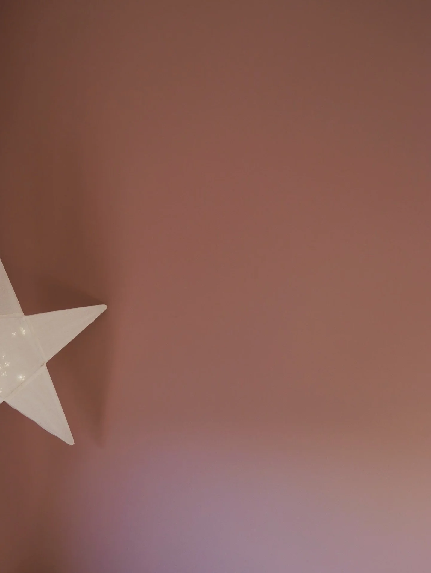 Warm, cocooning vibes with Sulking Pink paint and a gentle glow of starlight. #scandi #minimal #interior