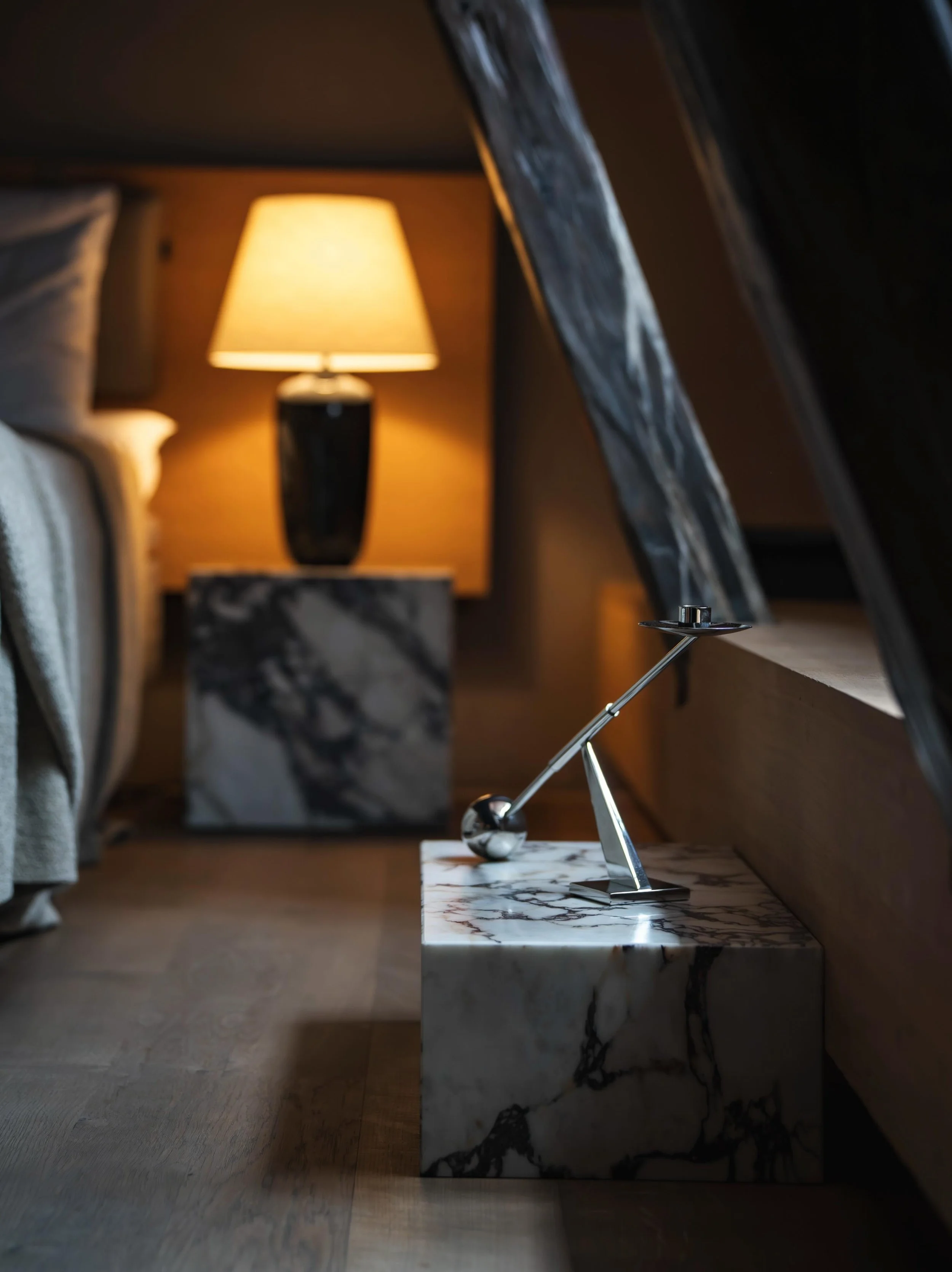 Chrome, softened by stone. 
A contrast I love: the cool precision of chrome against the organic movement of marble. 
Photographed by Eddie and Lou Joia Studio 
#interiordesign #chrome #marble #japandi