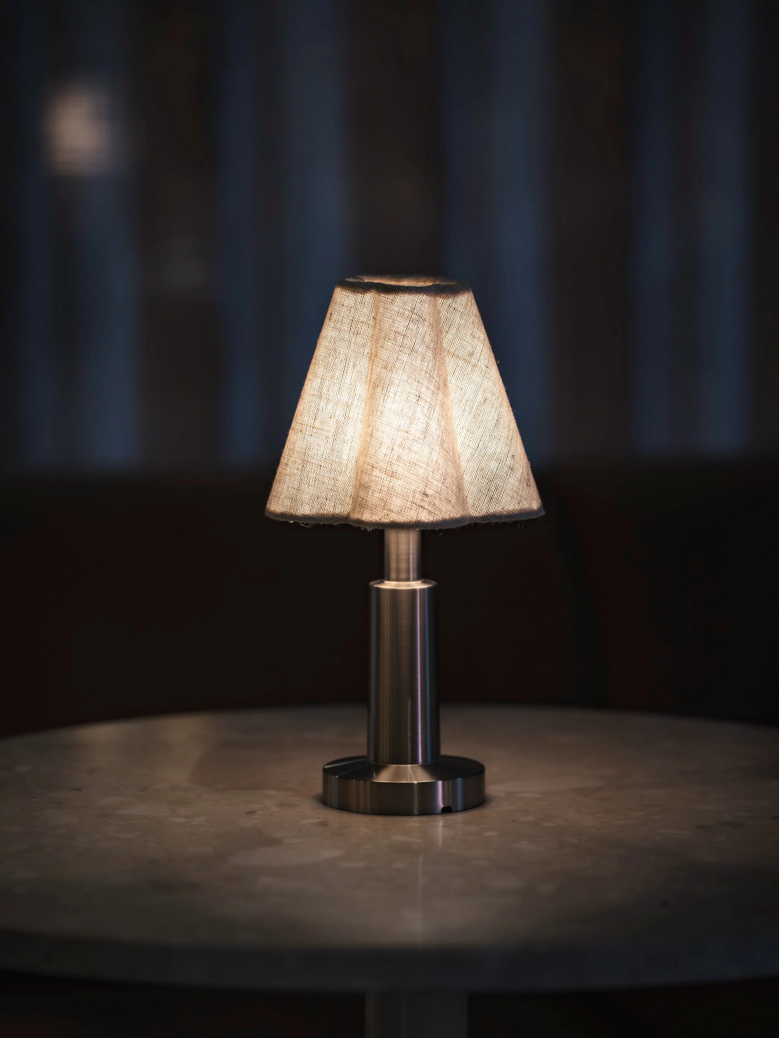 The new Admiral Portable Lamp by Audo Copenhagen is one of those rare pieces. Its soft linen shade diffuses the most beautiful warm light, while its sculptural silhouette feels both timeless and quietly contemporary.

Thoughtfully designed, beautiful