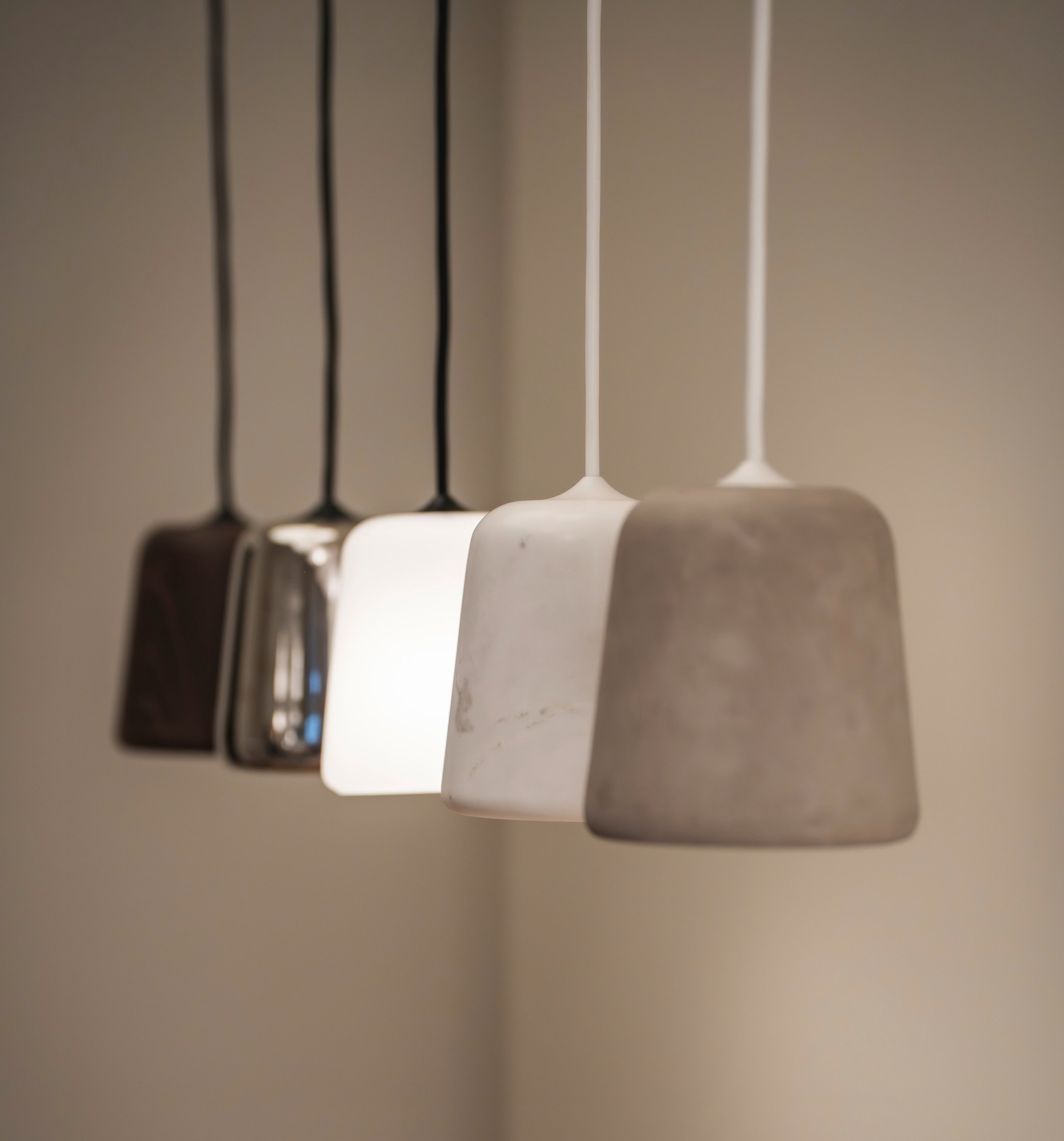 Five gentle lights, like a constellation, guiding the home into evening. #scandinaviandesign #interiordesign #japandi