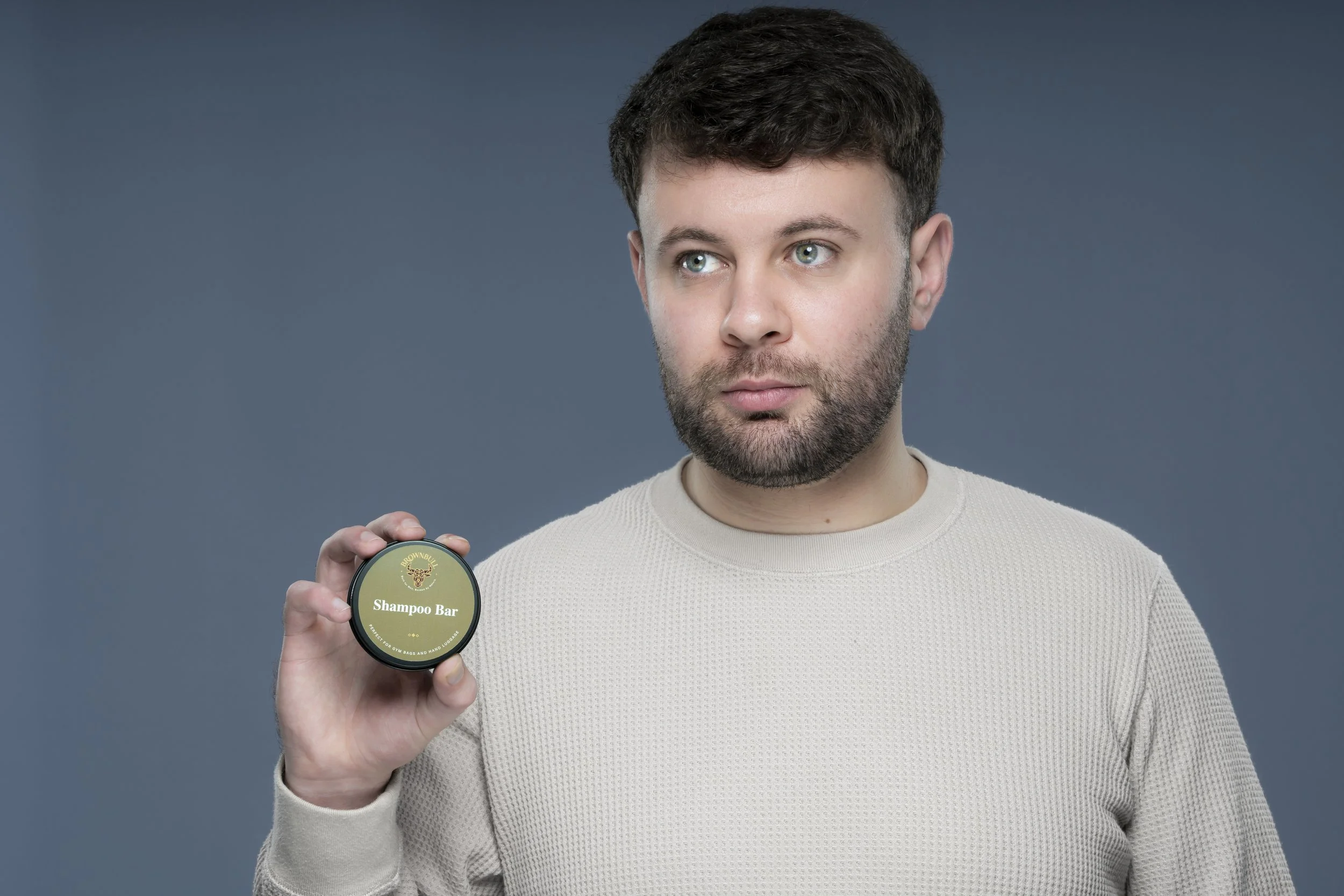 BrownBull Shampoo Bar in models hand