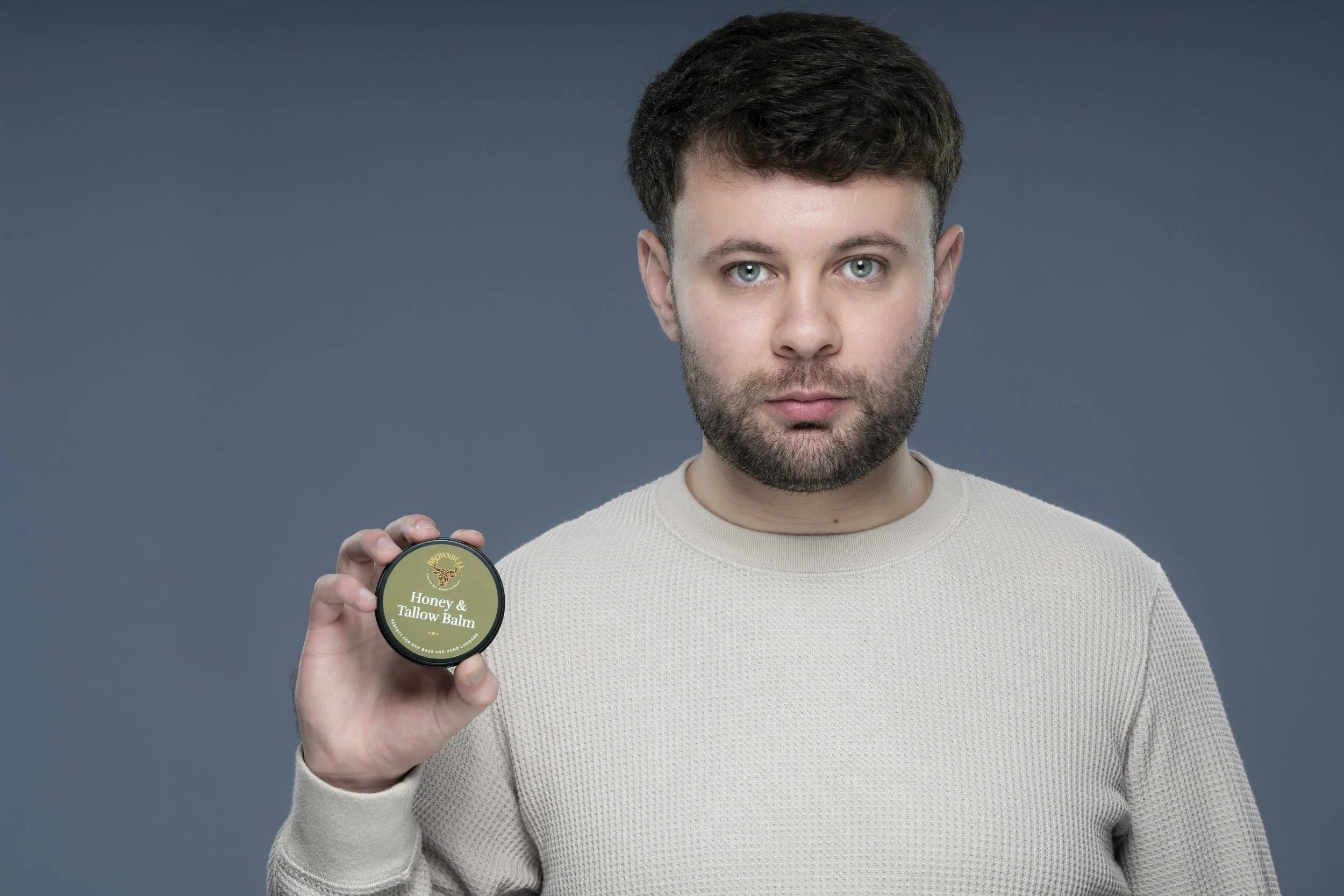 BrownBull Honey & Tallow Balm in models hands