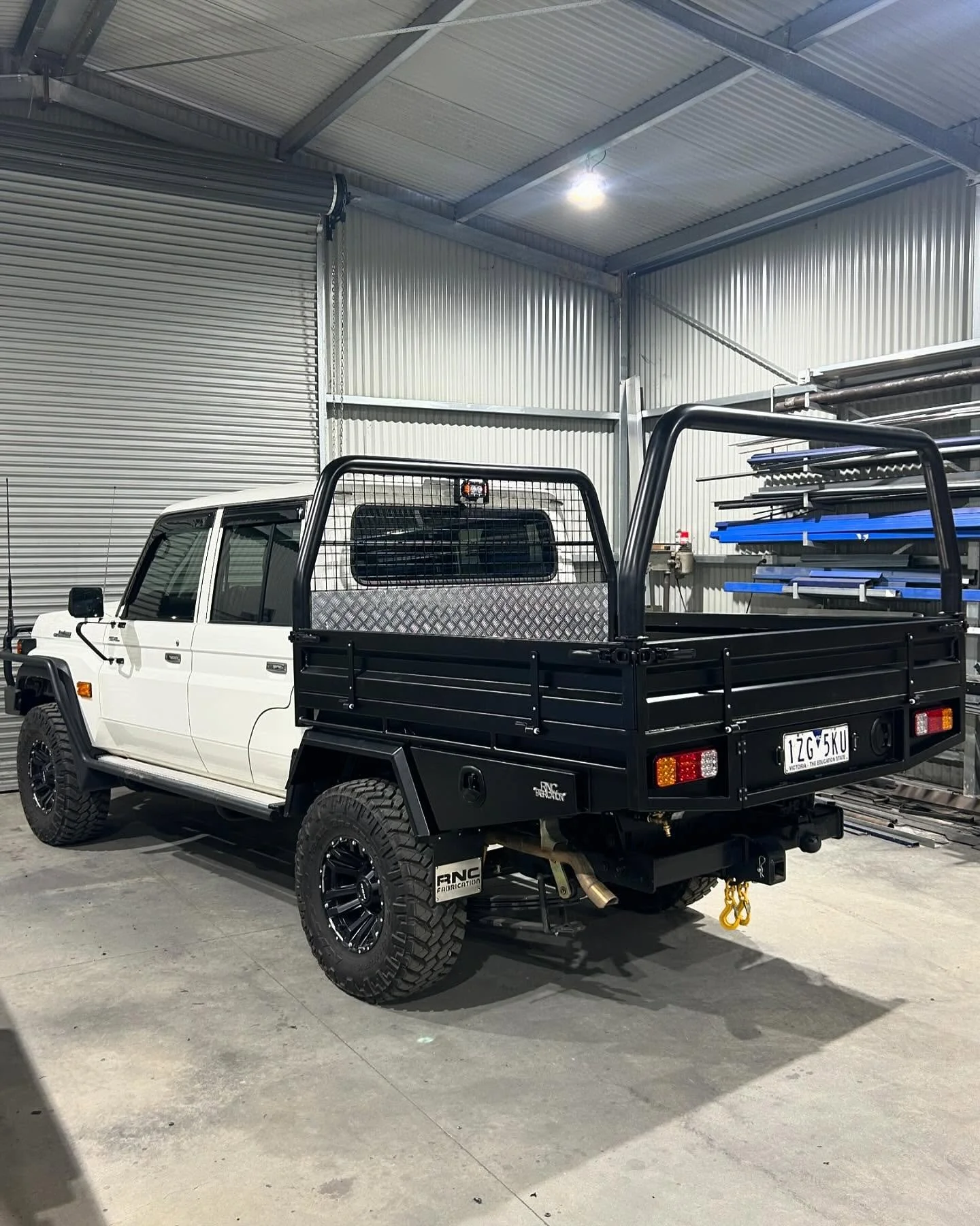 Another landcruiser tray finished! 

-Steel tray with 3 inch round headboard
-Aluminium floor 
-Aluminium tray sides 
-Aluminium guards and undertray toolboxes
-Undertray water tank
-Undertray spare tyre holder
-Rear removable hurdle