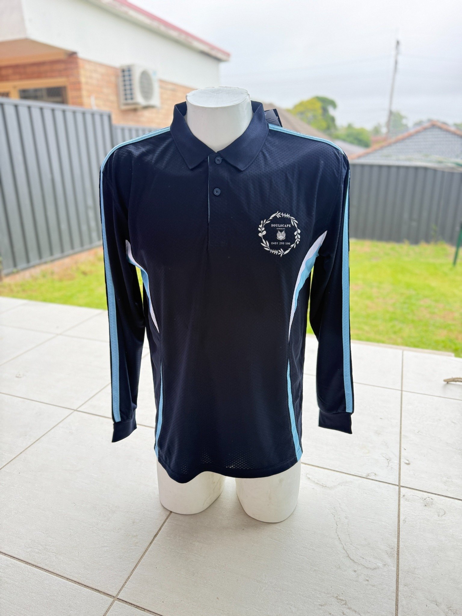 Custom printed JB’s work polos for Soulscape Gardens landscaping team in Sydney with front and back DTF printing