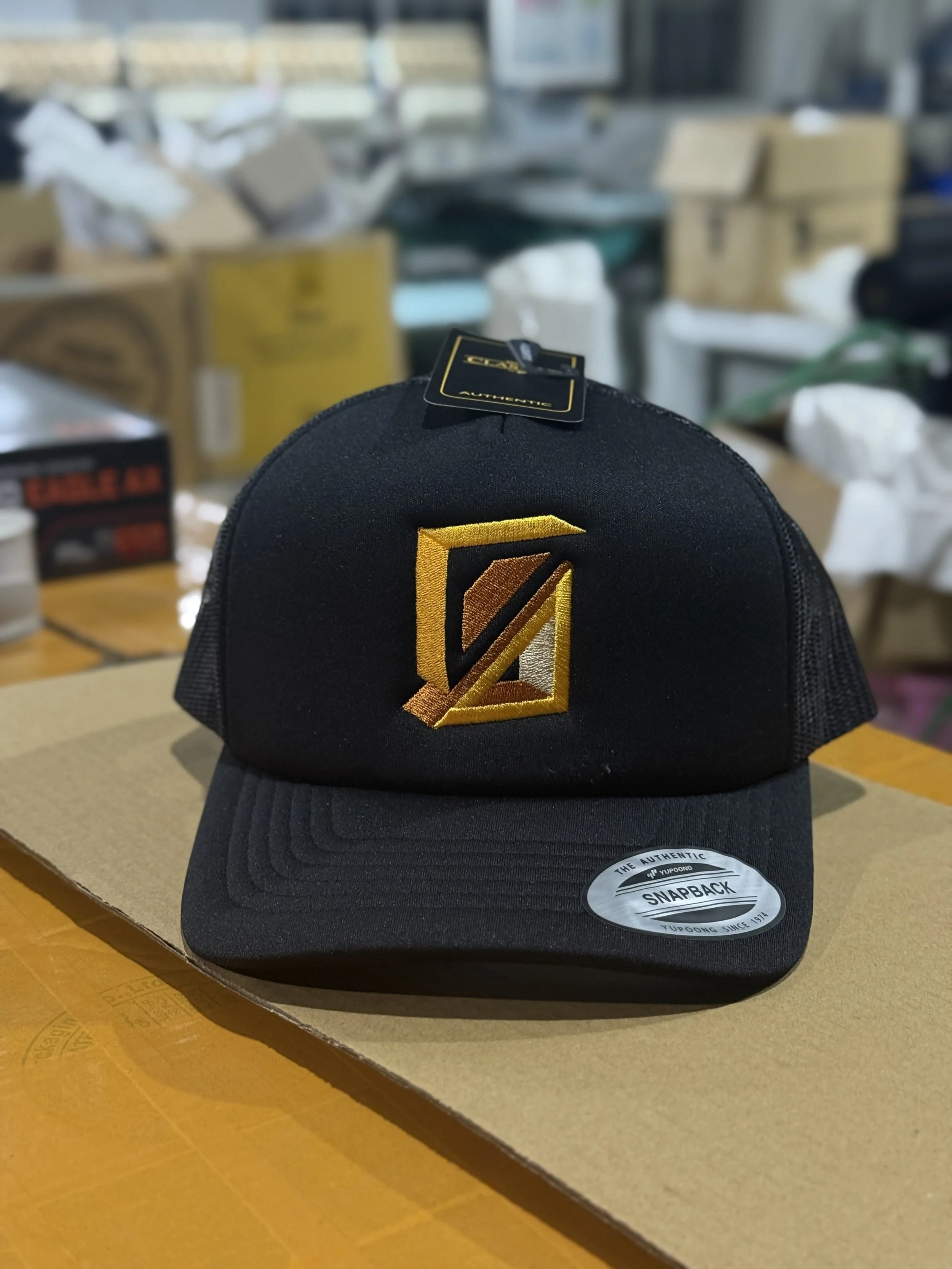 logo embroidery onto trucker cap