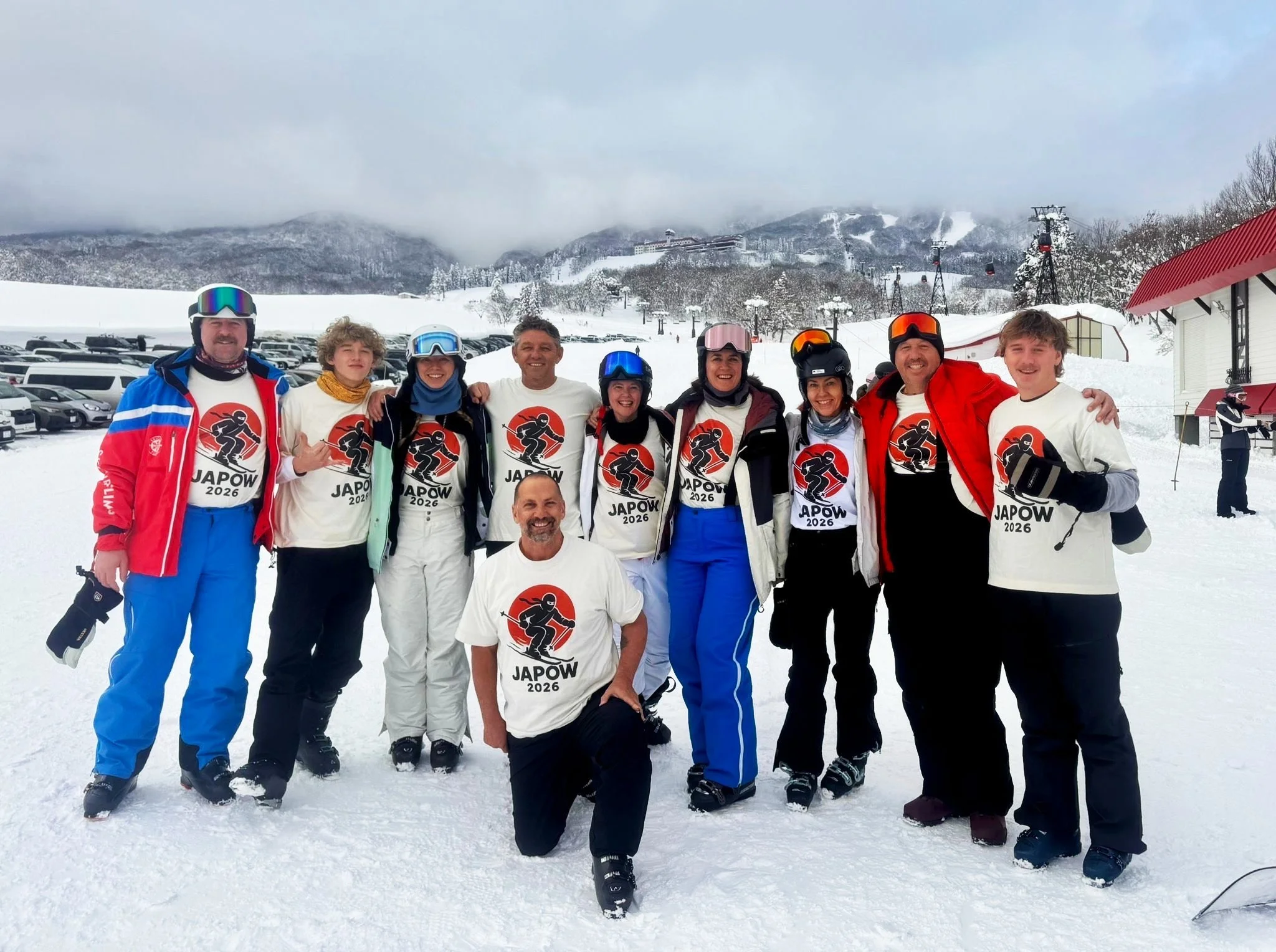 Custom t shirt printing Sydney group wearing printed shirts on a Japan ski trip by Pistol Clothing