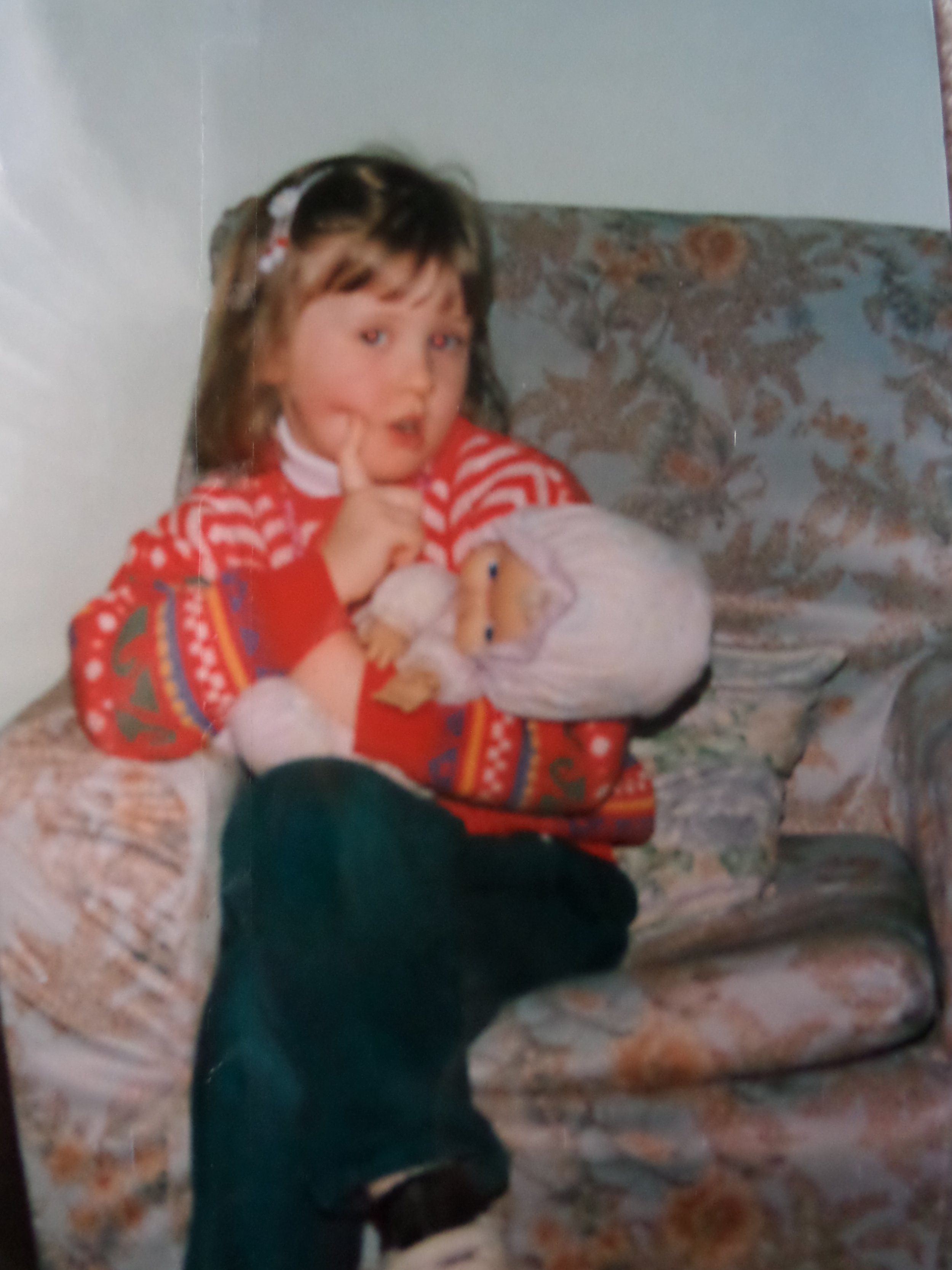 A childhood photograph of Christina Sayers, marking the early beginnings of a lifelong path that would eventually lead to the creation of Tides of Spirit and her work as a healer and channeler.