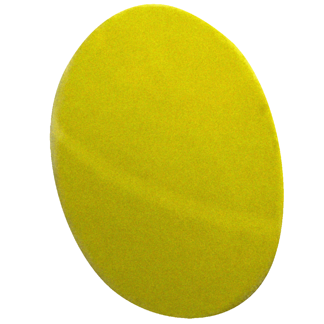 Close-up of a yellow sponge with a curved shape against a green background.