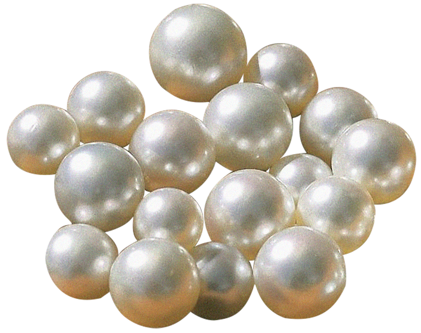 Multiple white pearls with a shiny, smooth surface, clustered together.