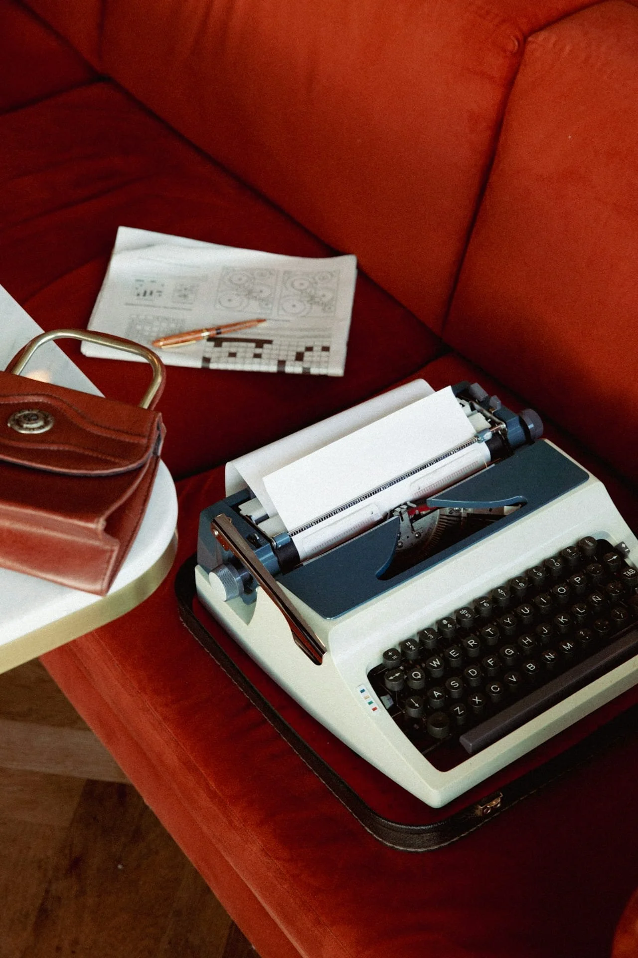 red couch with a typewriter