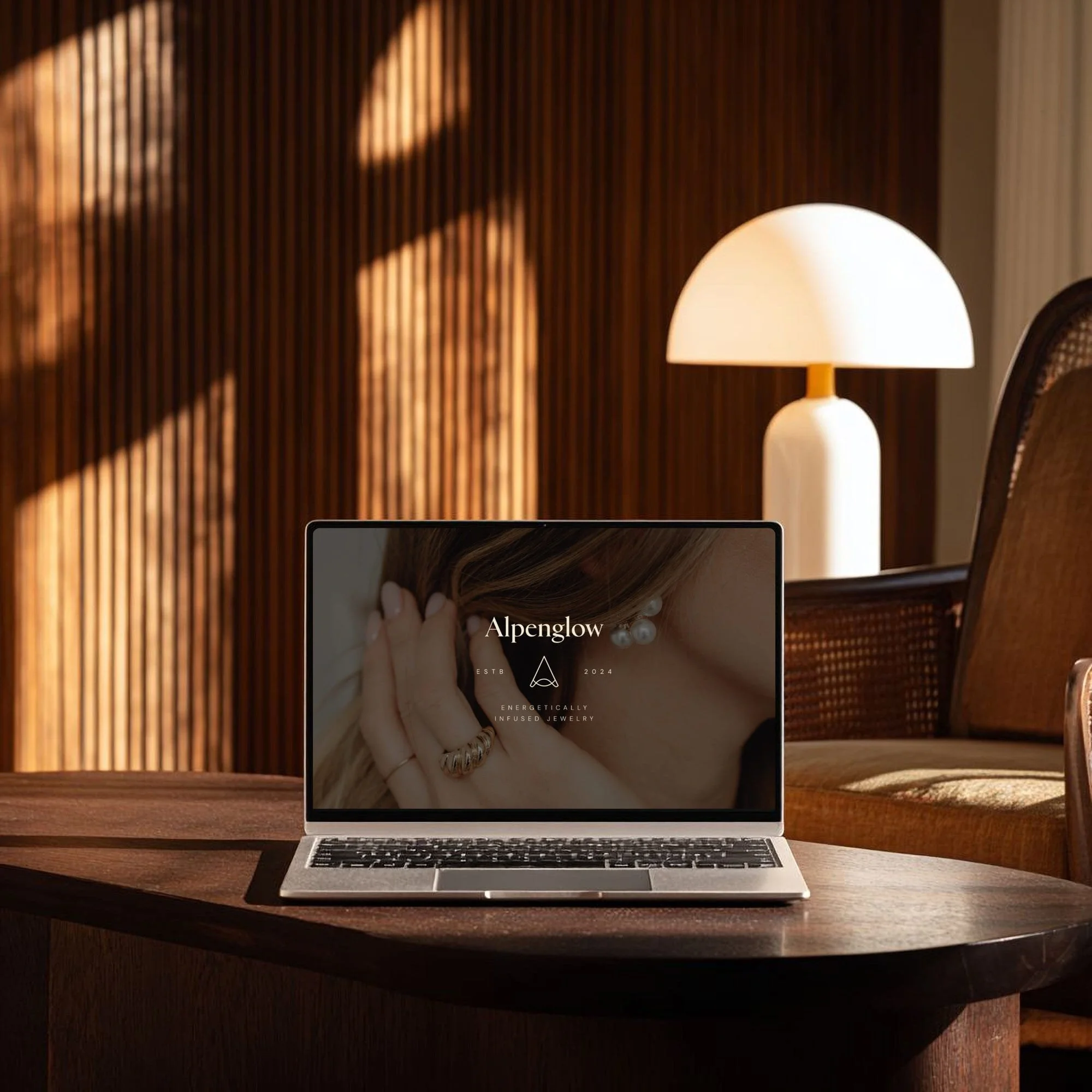 tilt-scroll - Laptop mockup of Alpenglow Jewelry brand - web design and SEO studio