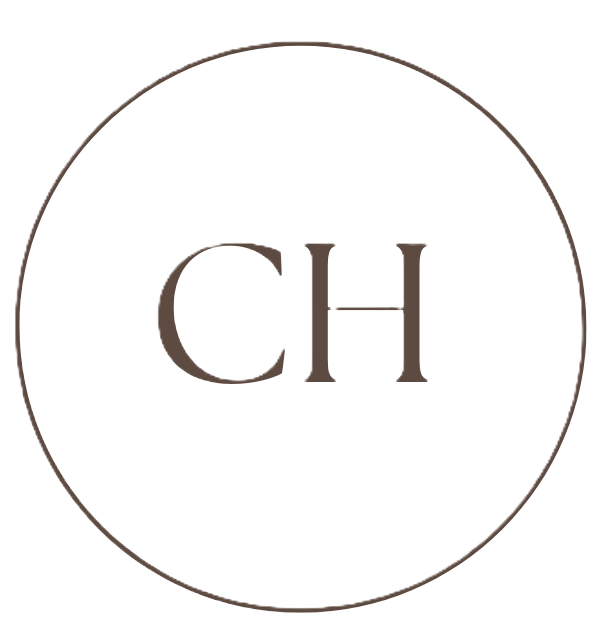 A black circular logo with a thin white border, featuring the letters "CH" in gray center.