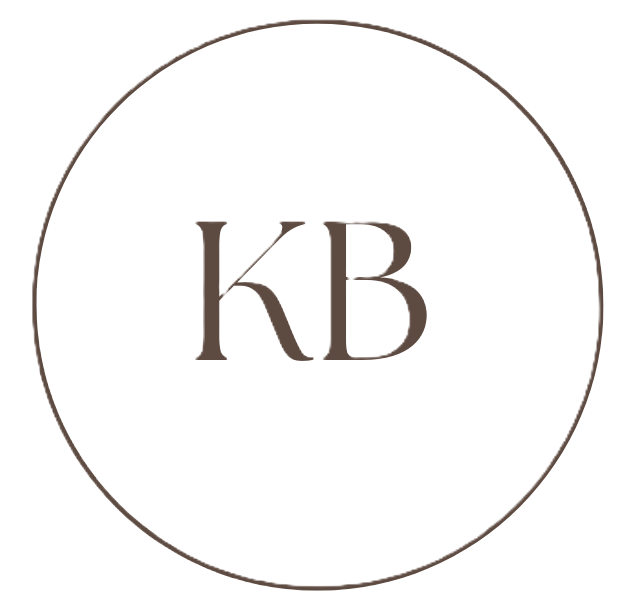 A circular logo with the initials "KB" in the center, surrounded by a thin white outline on a dark background.