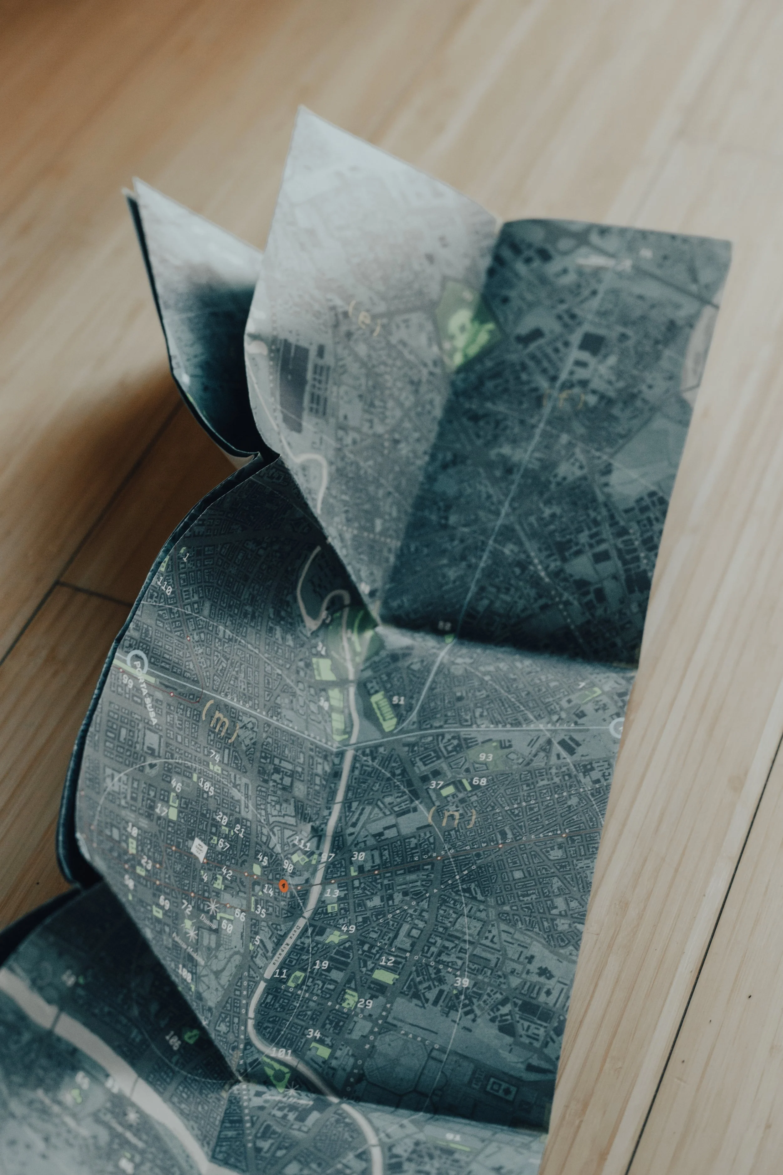 A photograph of a map on the floor.