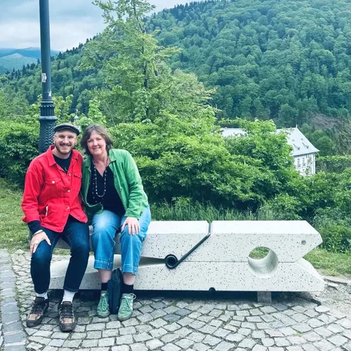 Jack and Jane sitting together outdoors