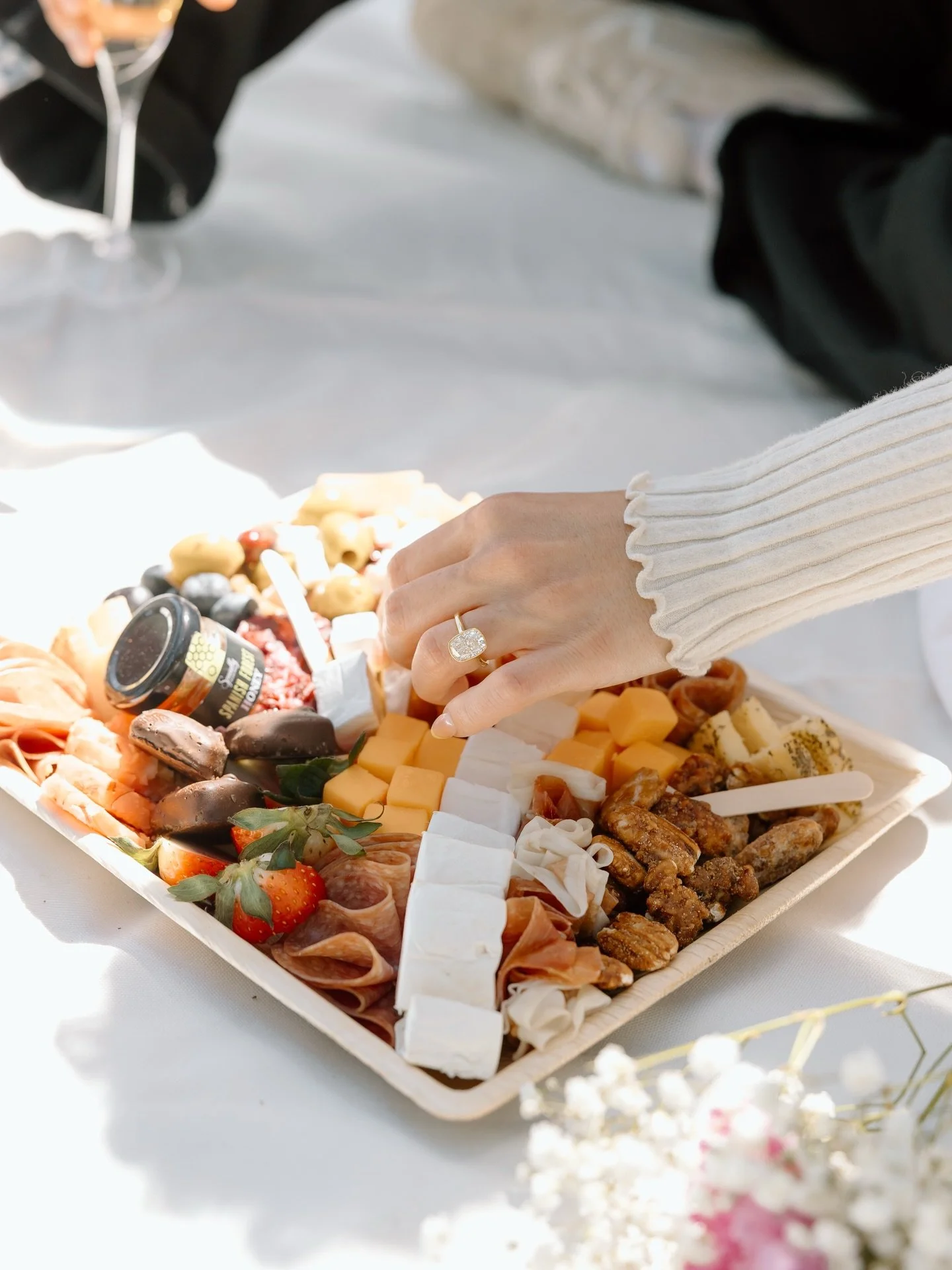 Love was in the air and so was the smell of good cheese. ✨
Nothing sweeter than celebrating an engagement with a beautiful moment, a cozy picnic, and a charcuterie board made for two. Cheers to love, laughter, and the beginning of forever.