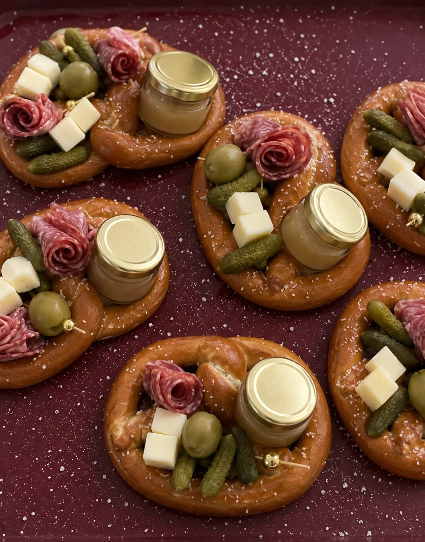 These charcuterie pretzels are the perfect grab-and-go treat for girls nights, office lunches, events, or just because.

Now offering delivery &mdash; fresh pretzels topped with meats, cheeses, pickles, olives &amp; more, brought straight to your doo