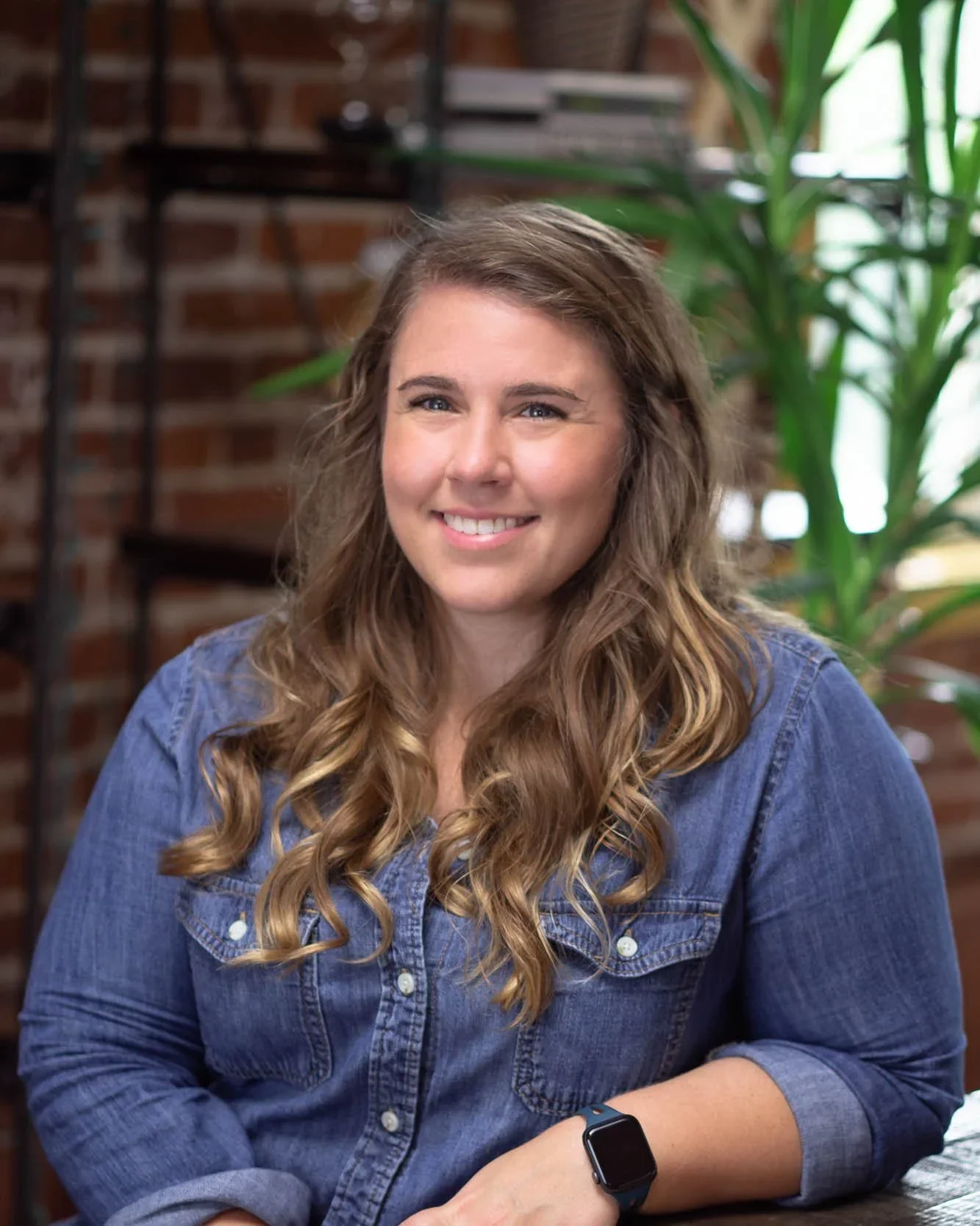 Whitney Delaney, Co-founder & Designer at Squarely Creative.