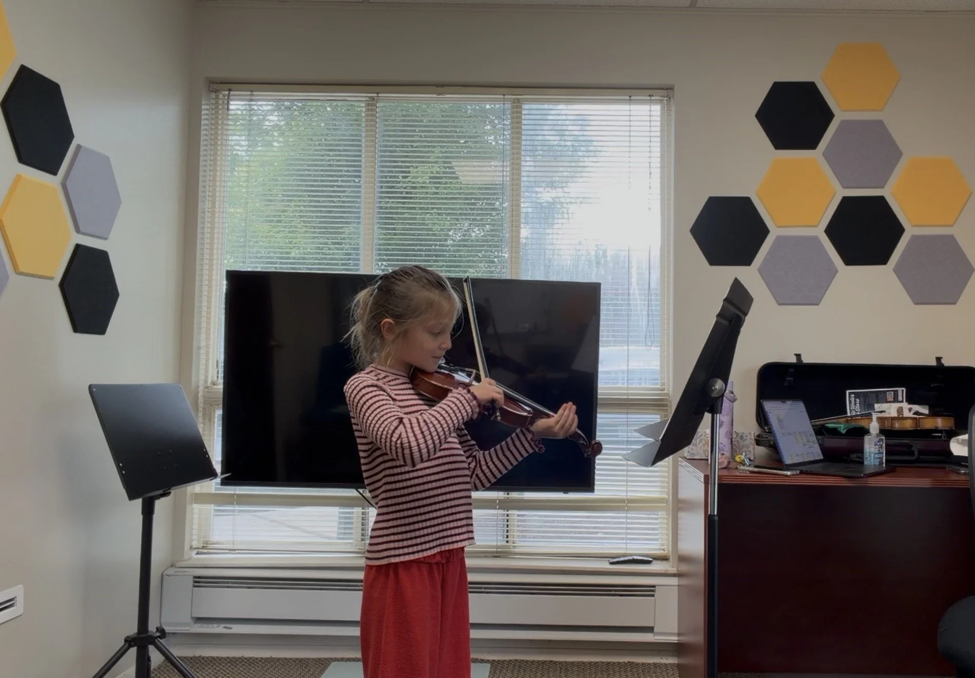 student playing the violin