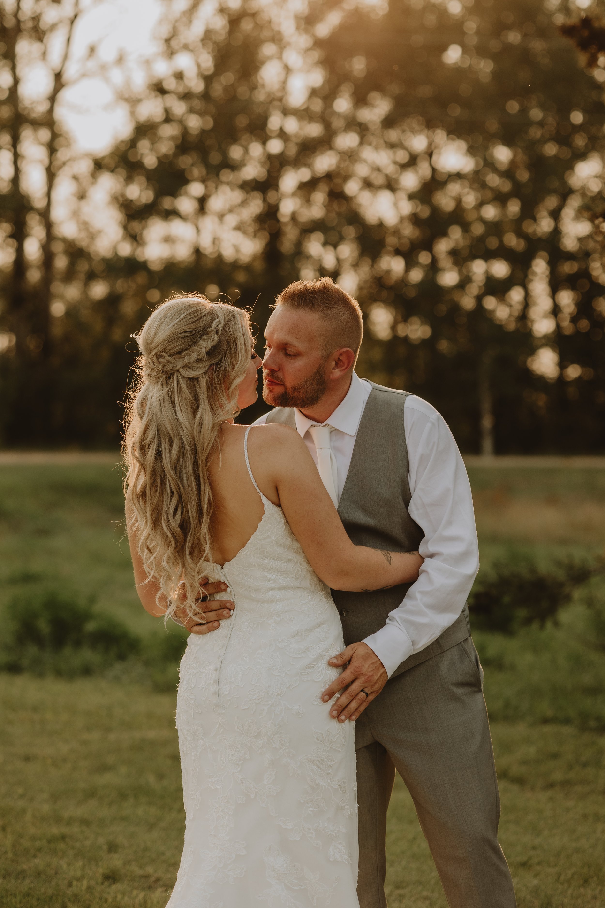 Capturing a romantic golden hour kiss during this intimate backyard wedding in Edmonton, Alberta