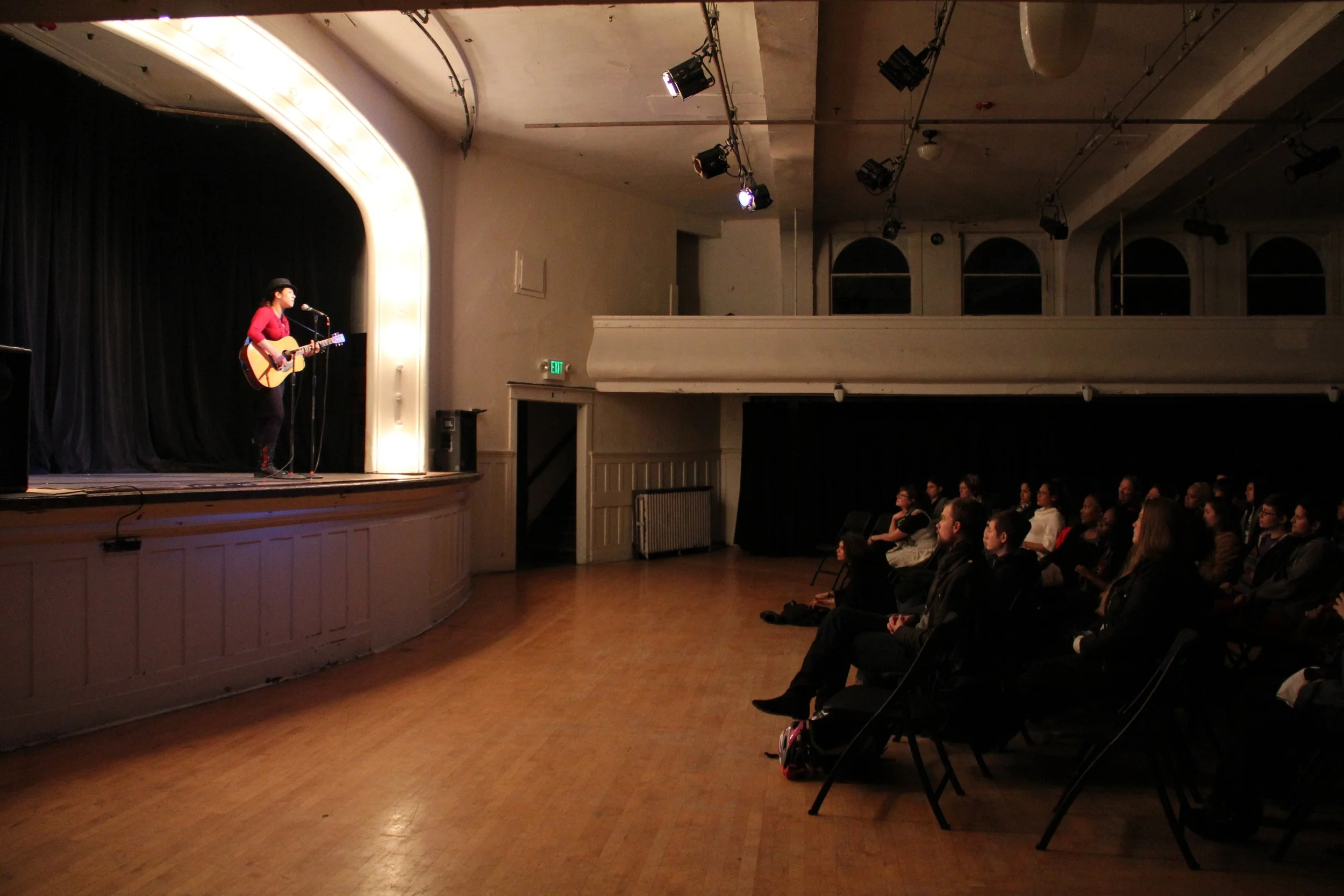 Performer at Voices Rising Seattle Event