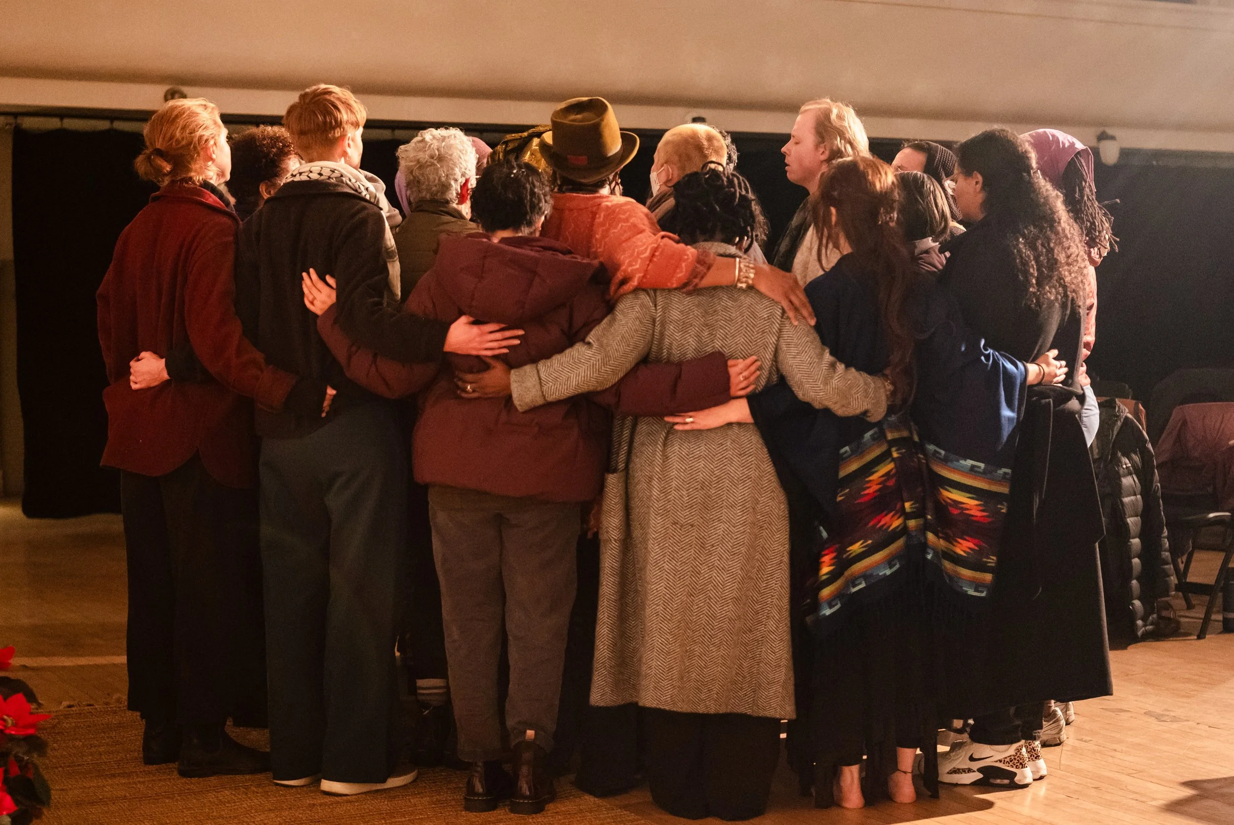 Community embrace at Voices Rising Seattle Event