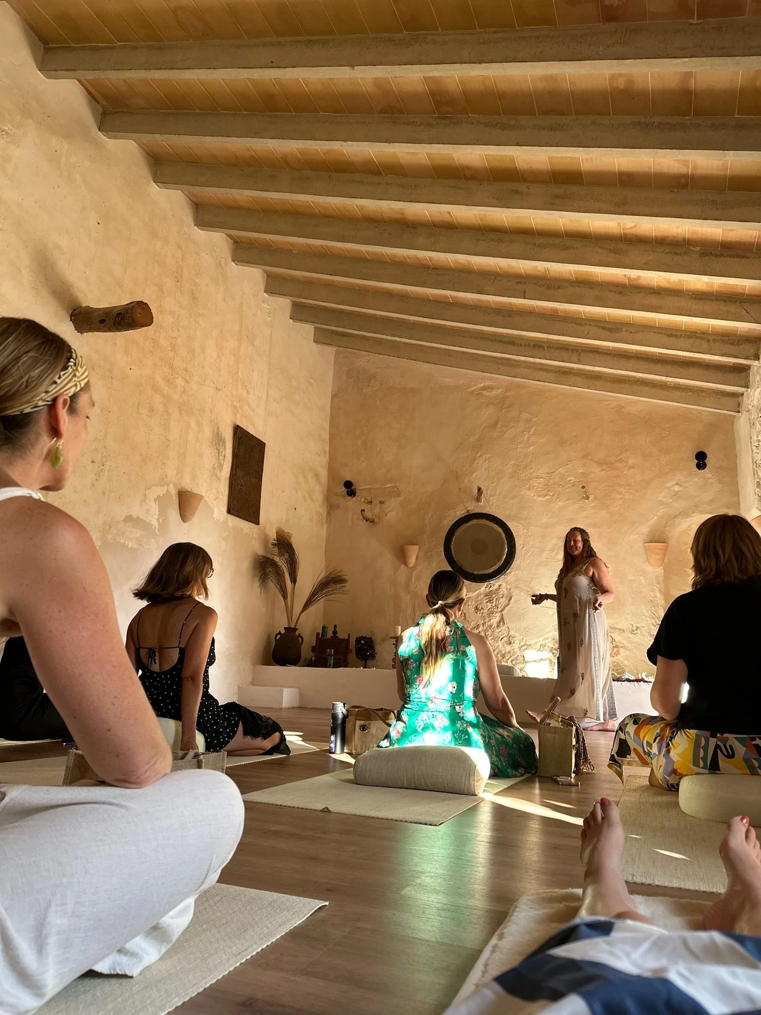 Woman Painting on Blanket Outdoors