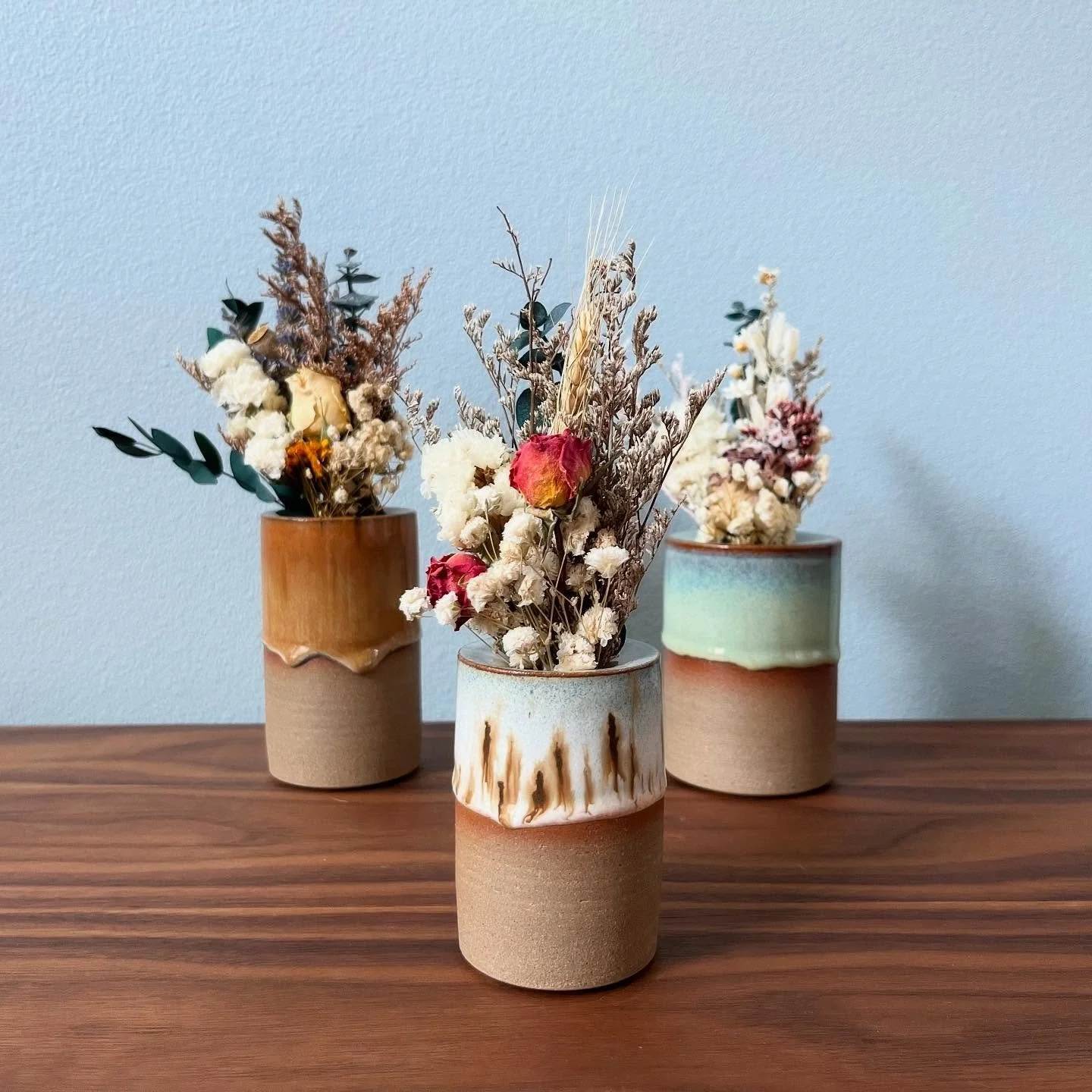 Set of bud vases I made a couple months back. These were part of the gift series I did for my wife on our 8yr wedding anniversary. 

I was aiming to have these step up in size to allow them to hopefully work well as a set, a mix-n-match pair, or poss