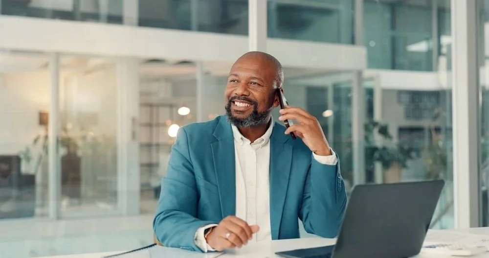 Businessman with phone coaching