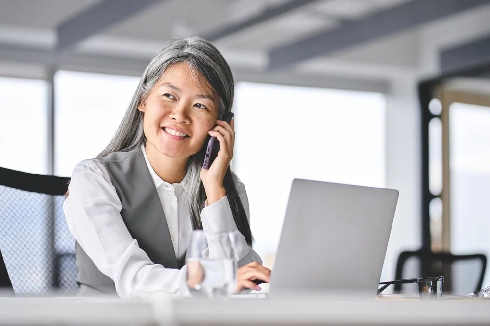 mature business woman on coaching call