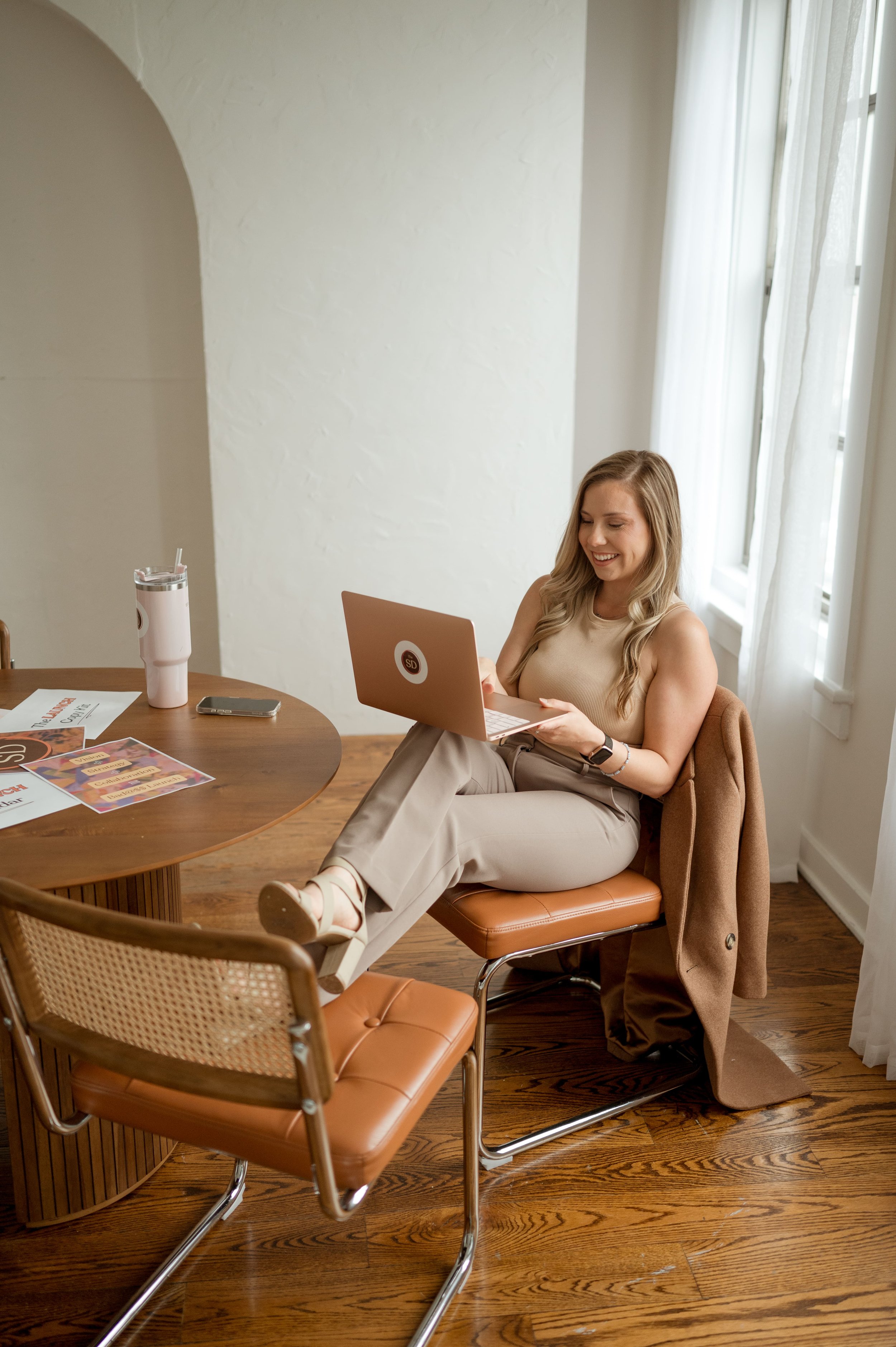 Photo of Marketing Strategist at desk with laptop