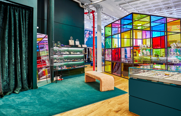 Boutique interior with jewelry and handbag displays