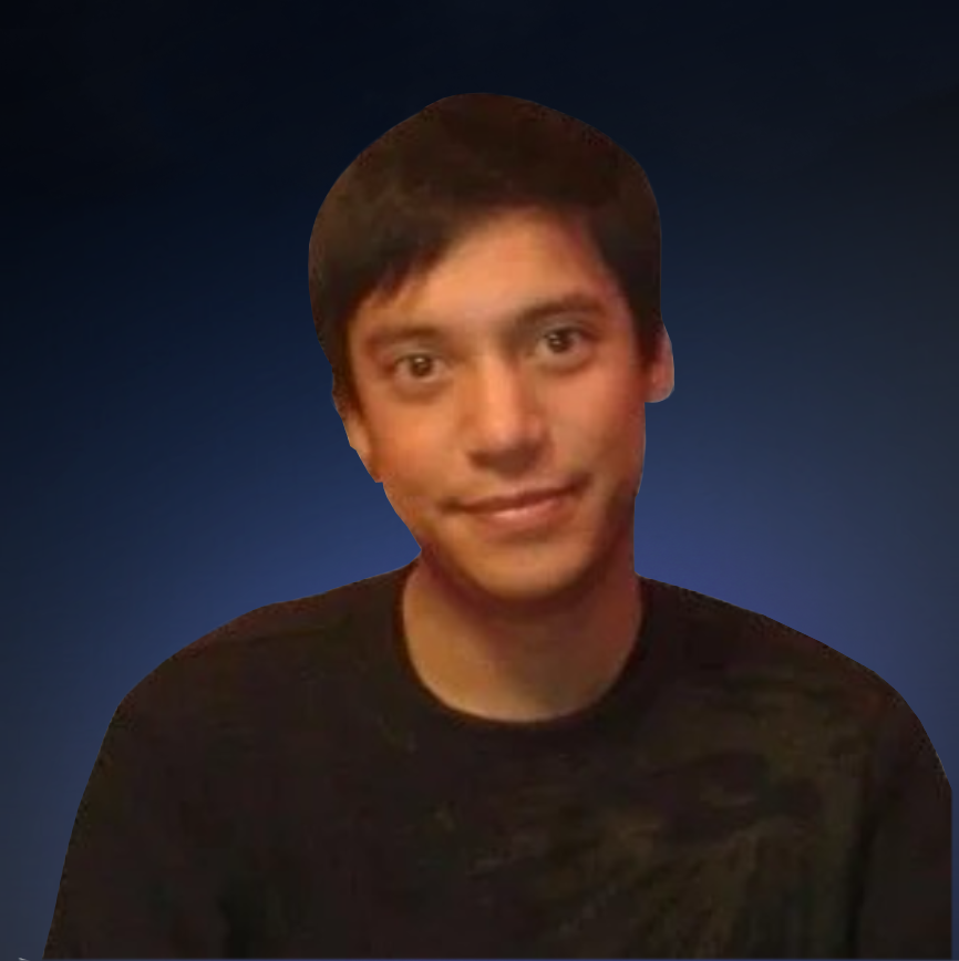 A young man with short dark hair smiling at the camera, wearing a dark shirt, against a plain white background.