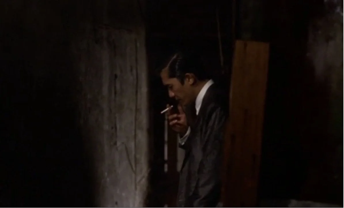 tony smoking solo staircase.jpeg