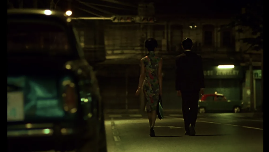maggie + tony walking together backshot.webp
