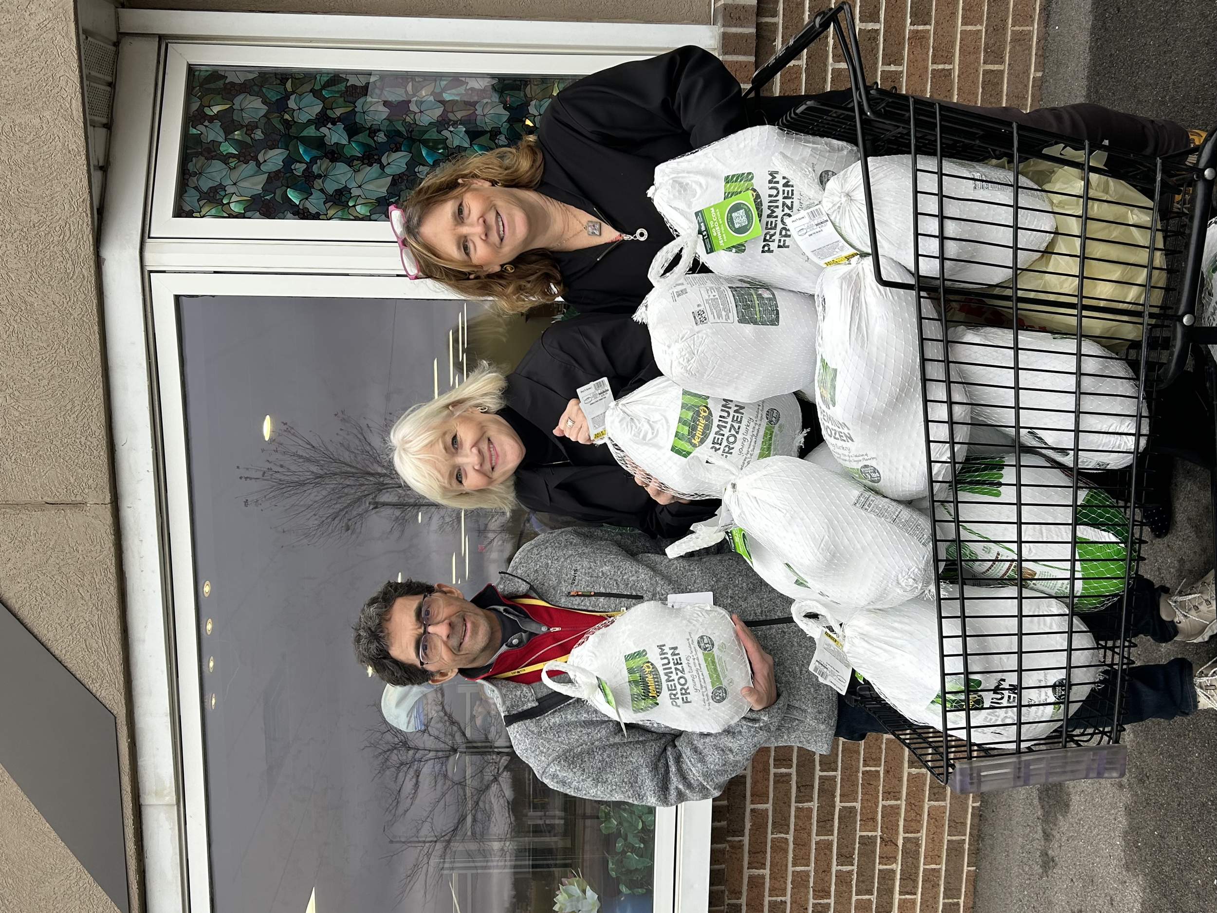 Service League donated 12 turkeys to Father Carr for families to enjoy on Thanksgiving.