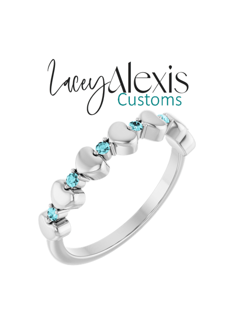 71999 heart band with blue zircon sterling silver angled view.PNG