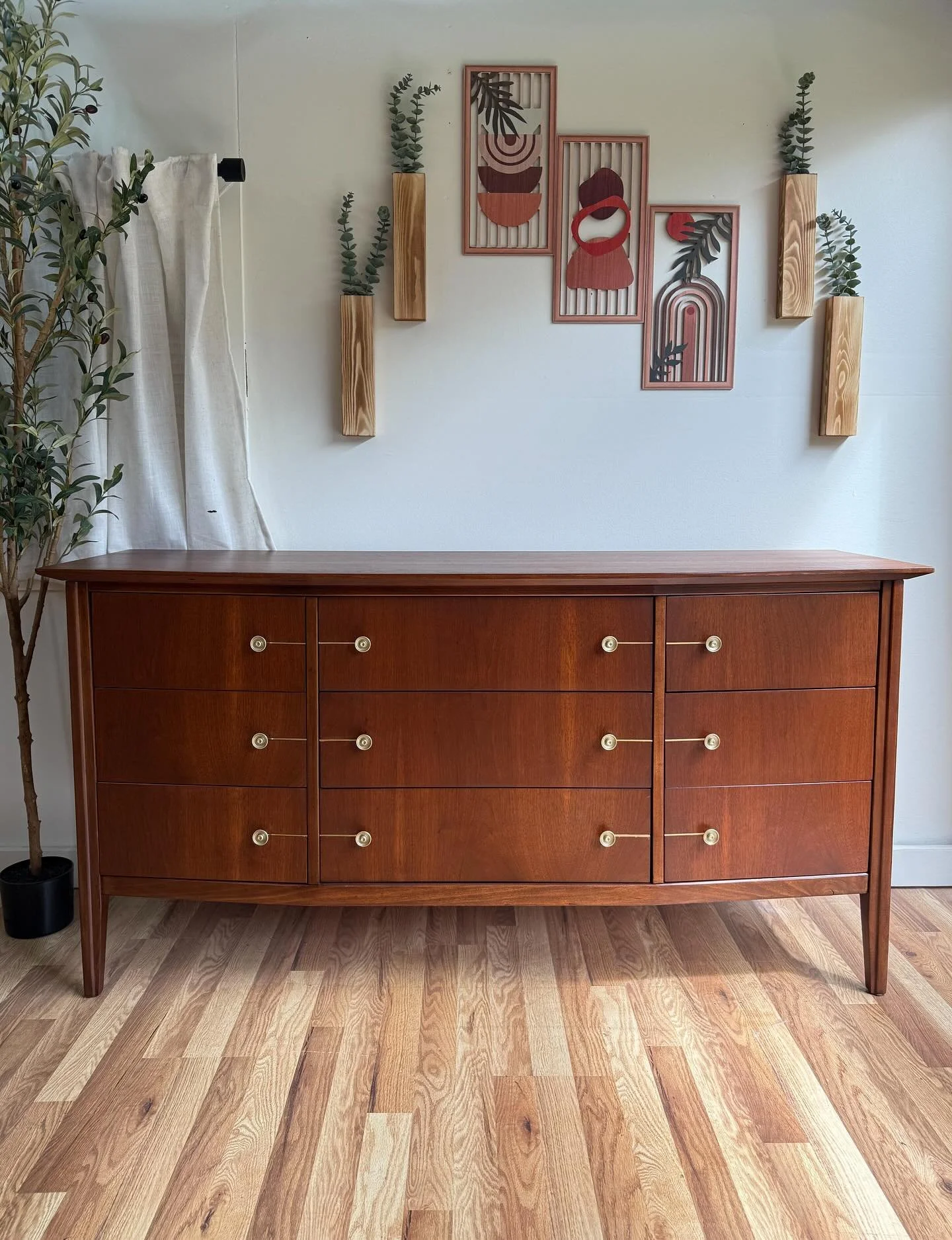 (SOLD) Mid century modern MCM walnut 9 drawer dresser. Unmarked but circa 1960&rsquo;s. Really cool bow-front design where the entire front has a slight curve to it. Really unique detail. Cool gold pulls &amp; gold accents on each drawer. Features 9 
