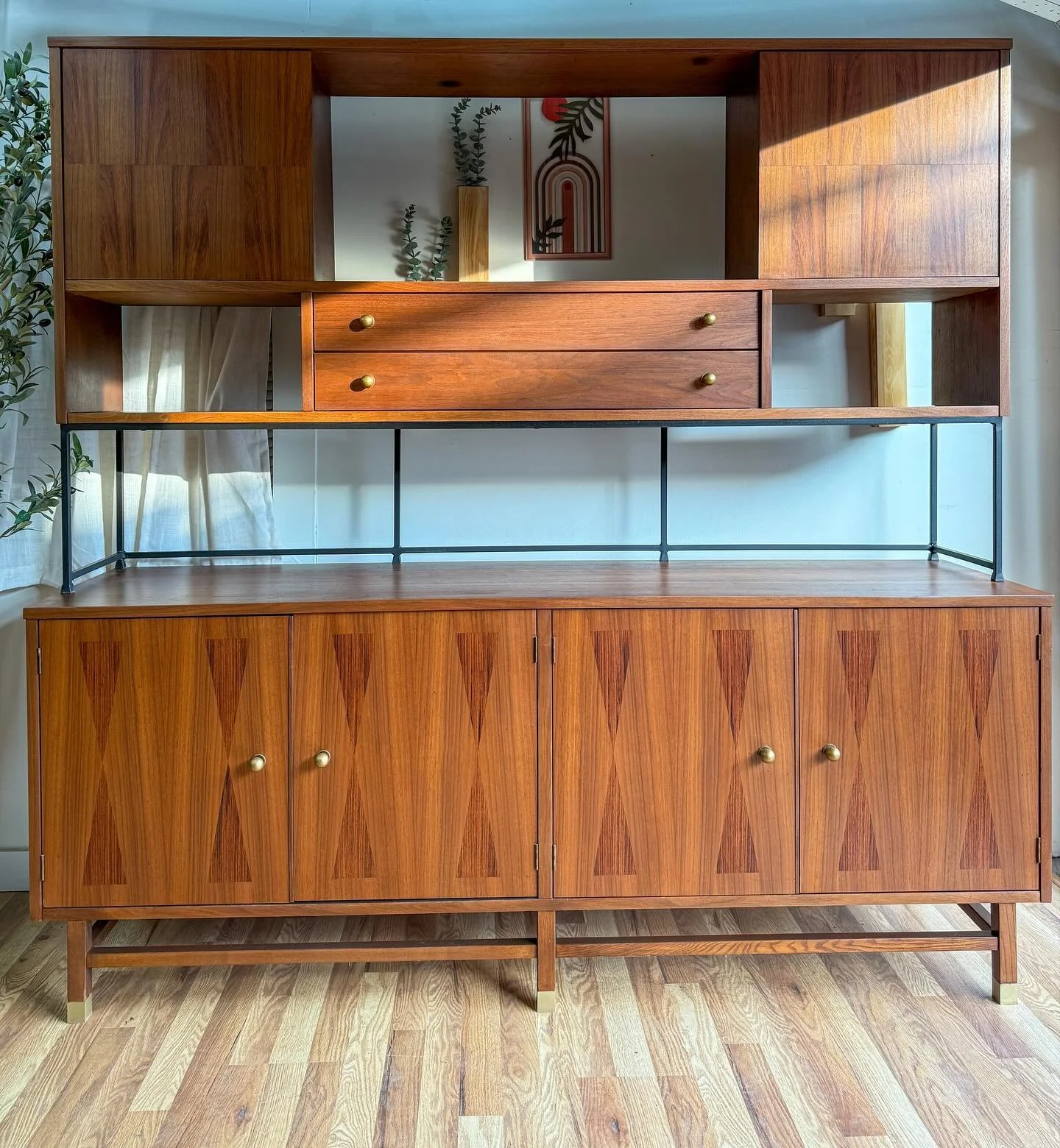 MCM mid century modern vintage walnut &amp; rosewood two piece credenza &amp; hutch by Stanley. Circa 1960&rsquo;s. This two piece credenza features absolutely beautiful walnut wood grains &amp; rosewood &lsquo;bow-tie&rsquo; inlays all throughout, c