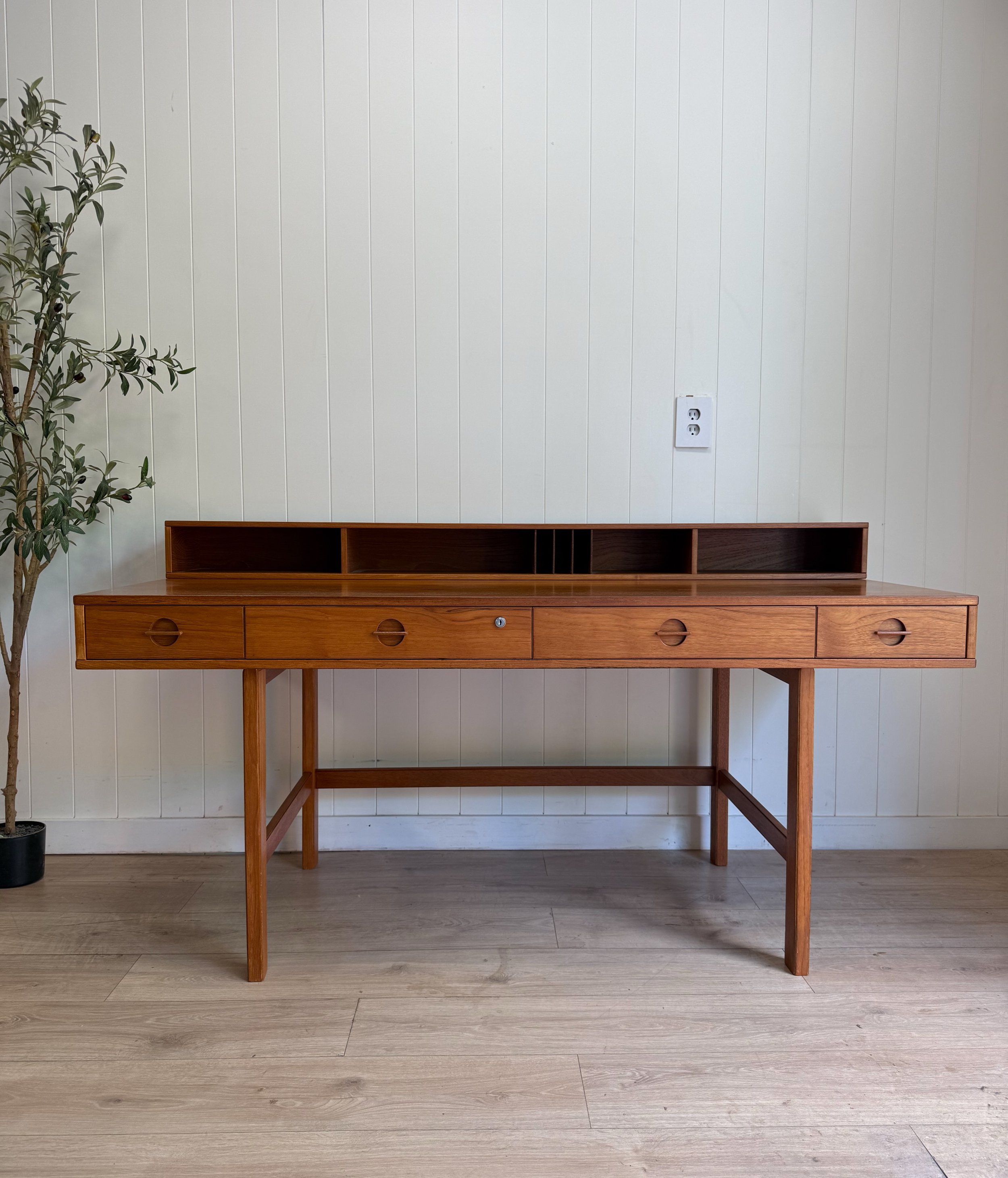 MCM mid century modern vintage danish teak flip top desk by Peter Lovig. Beautiful teak wood grains, 4 long drawers, flip-top storage cubby design (shown in video), finished back so it can float anywhere in a room. Absolutely beautiful &amp; iconic s