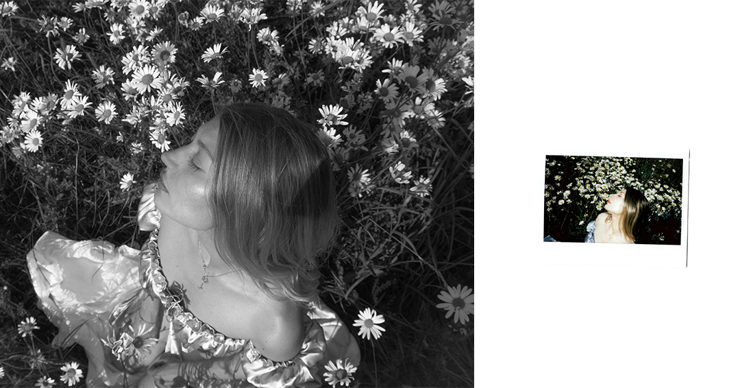 A woman with shoulder-length hair lying in a field of daisies with her eyes closed. The main image is in black and white, while a smaller color photo shows the same woman with daisies behind her in a sunny outdoor setting.