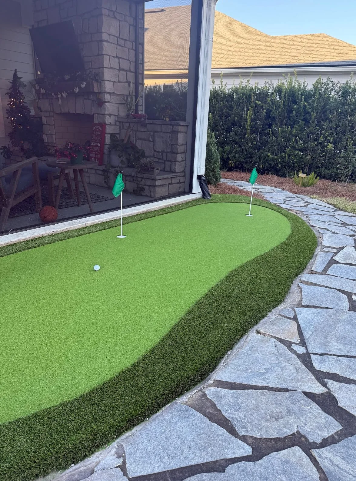 Custom backyard putting green installation Jacksonville FL by Bold Turf Co