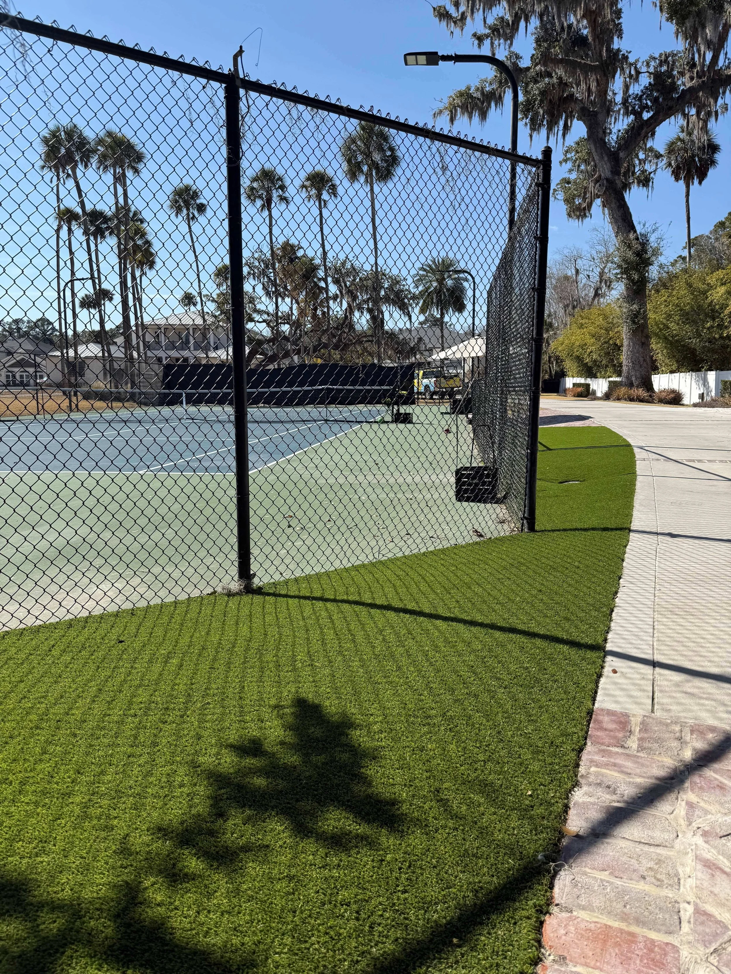 Commercial synthetic turf tennis court installation in St. Johns County FL